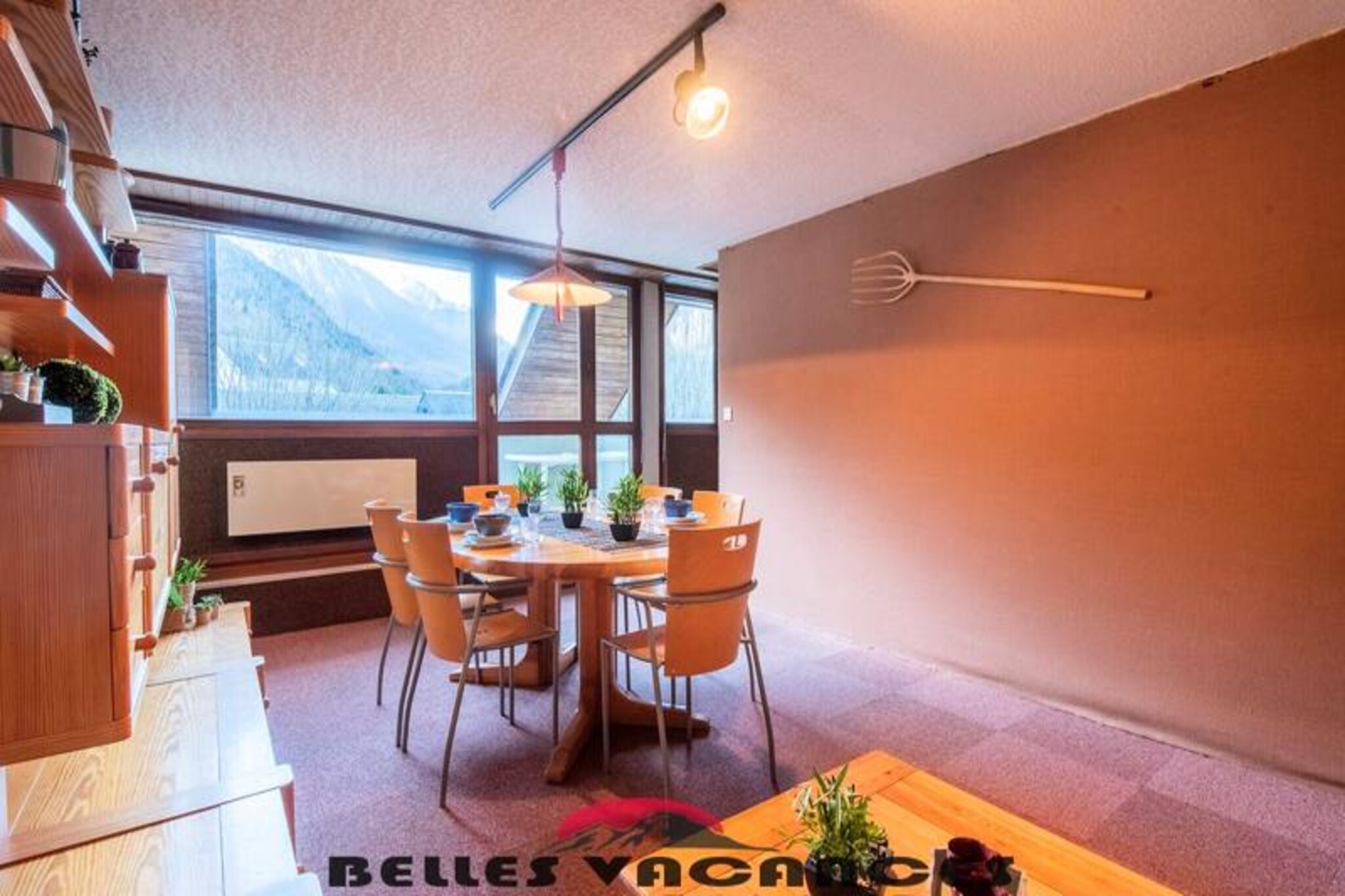 
This duplex apartment, perfect for 8 people, offers comfortable living space across two levels. The first level features a living room with a sofa bed and television, along with an equipped kitchenette, including a dishwasher, electric oven, and microwave. A separate bathroom and toilet are also available on this floor. On the second level, you’ll find two bedrooms with 140 cm beds and a third bedroom with bunk beds, along with a bathroom with a sink, toilet, and washing machine. The apartment also provides a ski locker for convenience. Pets are not allowed.

Located just 100 meters from the main shopping street and 190 meters from the cable car, this apartment is ideally positioned for easy access to local attractions, cafes, and markets. A free shuttle service near the residence connects guests to the cable car and the thermal baths sector, providing effortless access to the Pla d'Adet slopes. Whether you're looking to shop, dine, or hit the slopes, this location places you in the heart of Saint Lary Soulan.

The apartment is equipped with everything you need for a relaxing stay, including a well-appointed kitchen for preparing meals. A south-facing balcony offers stunning views, and the property is perfect for families and groups. The apartment also includes a washing machine and ski locker for added convenience.