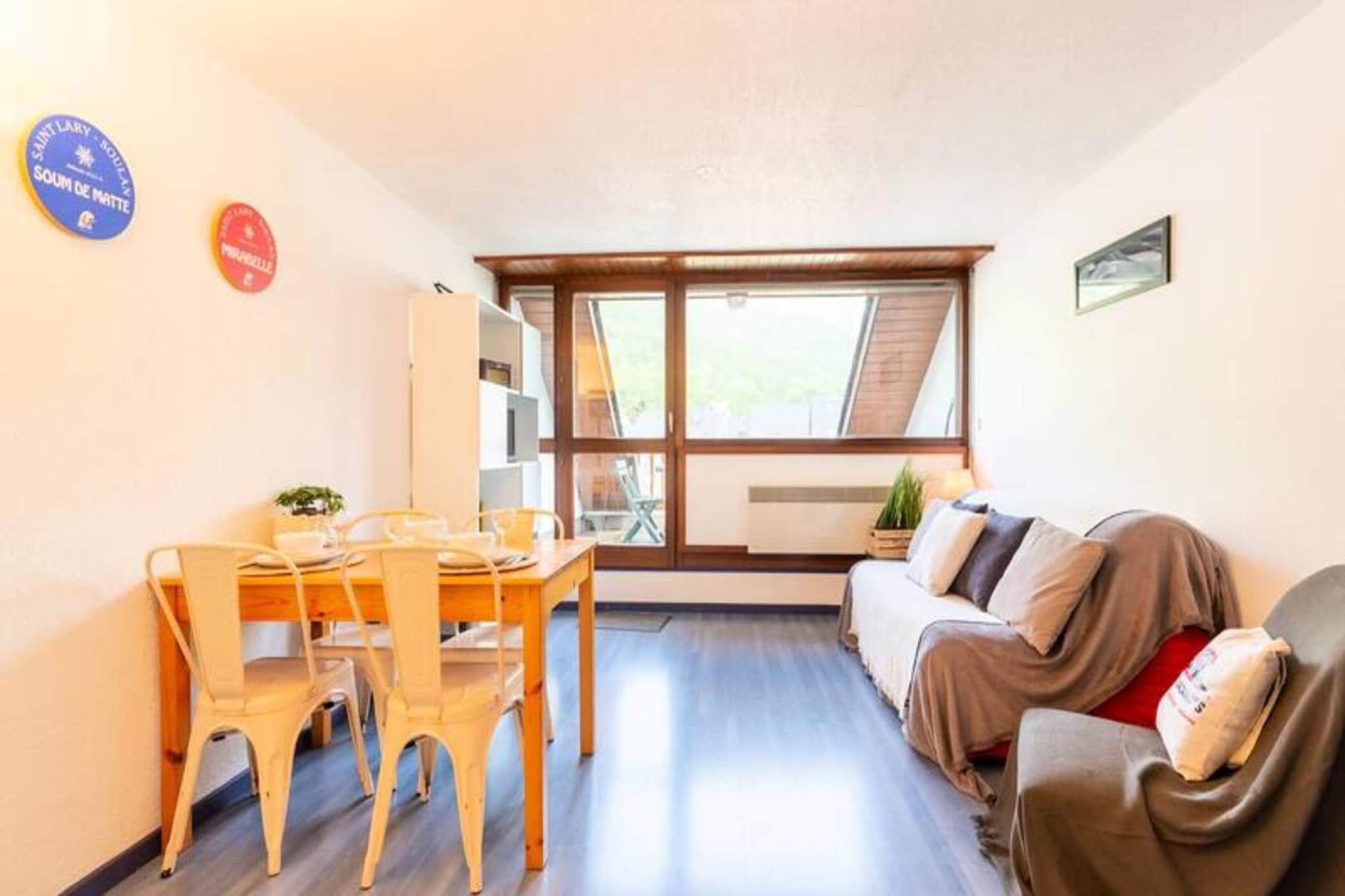 
This Type 2 apartment, ideal for 4 people, is located on the 1st floor of a residence with an elevator. The apartment features a cozy living room with a sofa bed (140x190 cm) and a TV, offering a relaxing space after a day of adventure. The bedroom is equipped with a comfortable double bed (140x190 cm). A bathroom with a toilet is included, and guests can use a ski locker for storing their gear. Pets are not allowed, ensuring a quiet and comfortable environment for all guests.

Located in the heart of the Pyrenees, the apartment is just 100 meters from the free shuttle stop, which provides easy access to the cable car or telecabine for skiing. The residence is also conveniently situated close to local cafes, restaurants, and shops, with the main shopping street just 150 meters away. Whether you are looking to relax or explore the slopes, the apartment's location offers both convenience and charm.

The apartment is equipped with an open kitchenette, perfect for preparing meals during your stay. The bathroom offers essential amenities, and the North-West facing balcony with garden furniture allows you to enjoy the fresh air and mountain views. The property offers easy access to skiing, hiking, and other outdoor activities, making it an ideal choice for your stay in the Pyrenees.