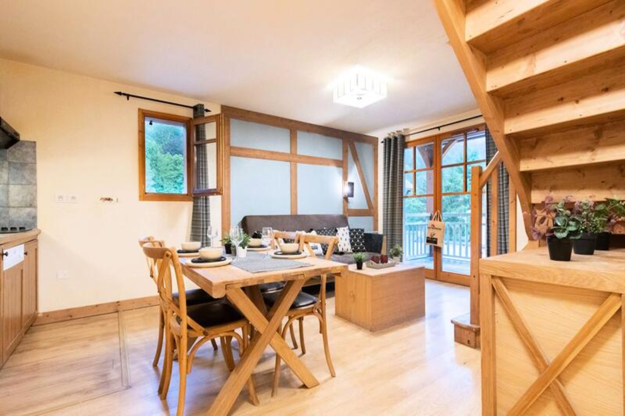 This charming 3-room duplex apartment is ideal for families or groups of up to 8 people. It features 1 mezzanine bedroom with 2 single beds, 1 master suite with a private bathroom, and a cabin with 2 bunk beds. The living area includes a 2-seater convertible sofa and TV. Guests can enjoy a balcony with garden furniture to relax in the sun. Pets are not allowed at this property, and a secure covered parking space and ski locker are provided to enhance your mountain getaway.

Located in the heart of Saint Lary Soulan, this apartment is only 300 meters from the Thermo Ludique Center and thermal baths, perfect for relaxing after a day of adventure. The new Telecabine is just 400 meters away, giving easy access to the slopes. Local shops, cafes, bars, and restaurants are all within walking distance, allowing guests to experience the vibrant atmosphere of the village.

The apartment is equipped with an open-plan kitchen featuring a ceramic hob, microwave, and dishwasher, making it easy to prepare meals during your stay. A modern bathroom with WC and additional amenities like Wi-Fi ensure a comfortable and convenient experience for guests. Whether you're here to relax or enjoy the mountain activities, this apartment is the perfect base.