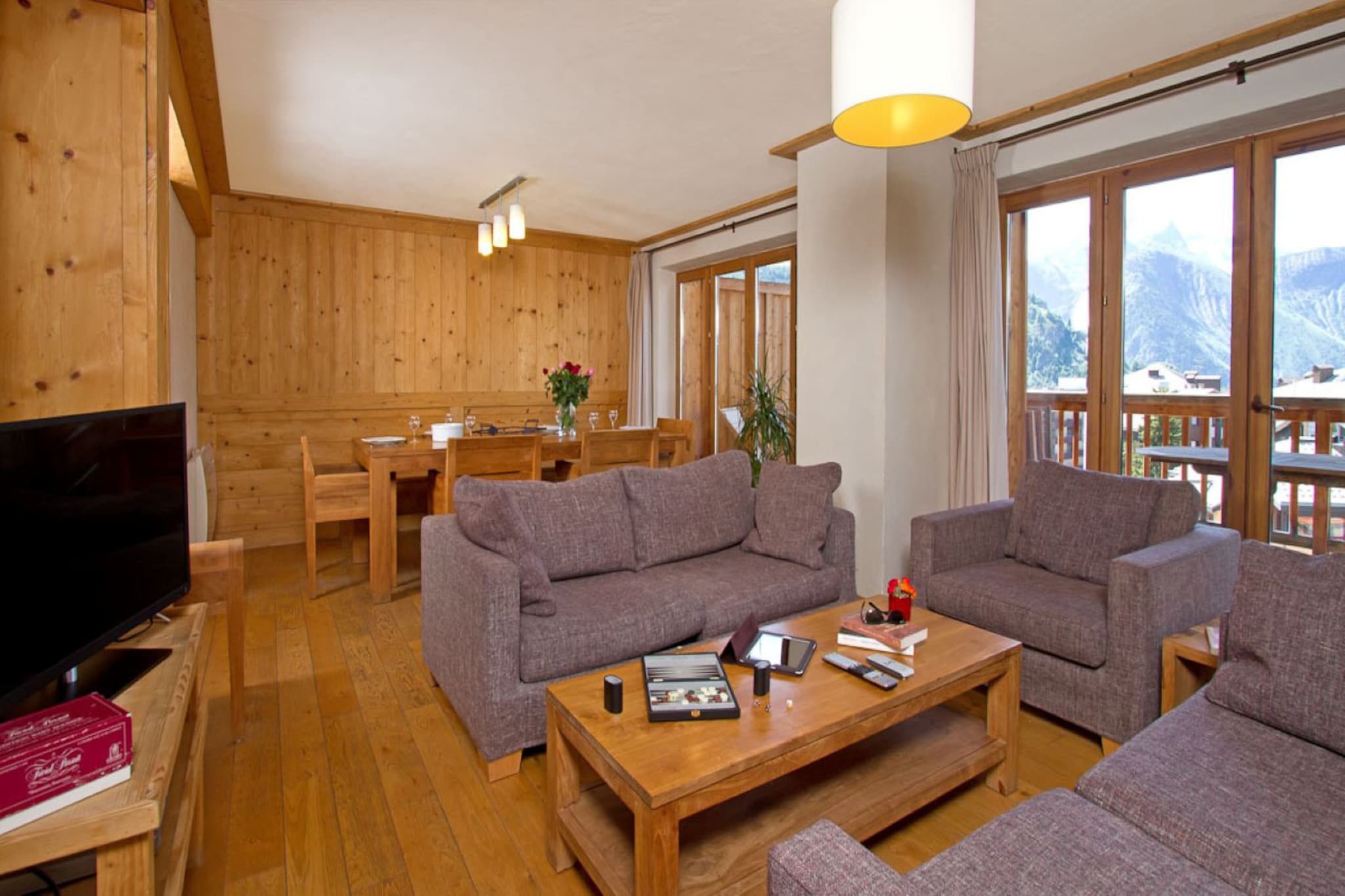 This spacious and homely apartment offers 111 m² of comfortable living space, perfect for accommodating up to ten guests. Located just 100 meters from the ski resort, it is ideally positioned for easy access to the slopes, making it a great choice for winter sports lovers. The property is situated in a family-friendly zone within a picturesque mountainous area, providing a peaceful retreat after a day of adventure.
The apartment is equipped with a range of convenient amenities, including an elevator, outdoor furniture, and a terrace to enjoy the stunning mountain views. For your convenience, there is also a garage and parking available, along with a TV for entertainment.
The open-plan kitchen, featuring a glass ceramic hotplate, is fully equipped with a refrigerator, microwave, oven, dishes, kitchen utensils, coffee machine, and kettle, allowing you to prepare meals with ease. Whether you're after an active day on the slopes or a relaxing stay in the mountains, this apartment offers the ideal setting for your next getaway.