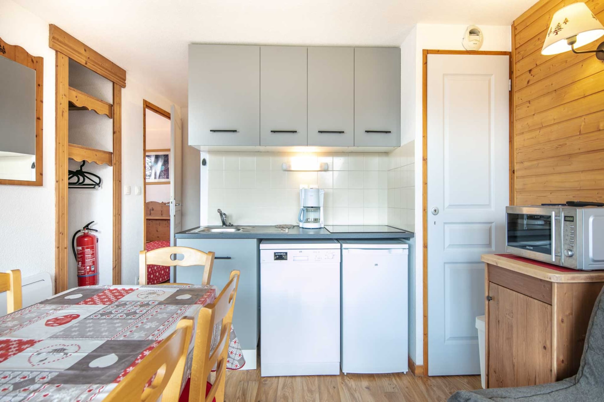 Living room(double sofa bed, TV), Kitchen(electric kettle, toaster, coffee machine, microwave, dishwasher, fridge, dishes and cutlery), bedroom(single bed, single bed), bedroom(single bed, single bed), bathroom(bath tub), Garden Furniture , balcony, parking, hairdryer