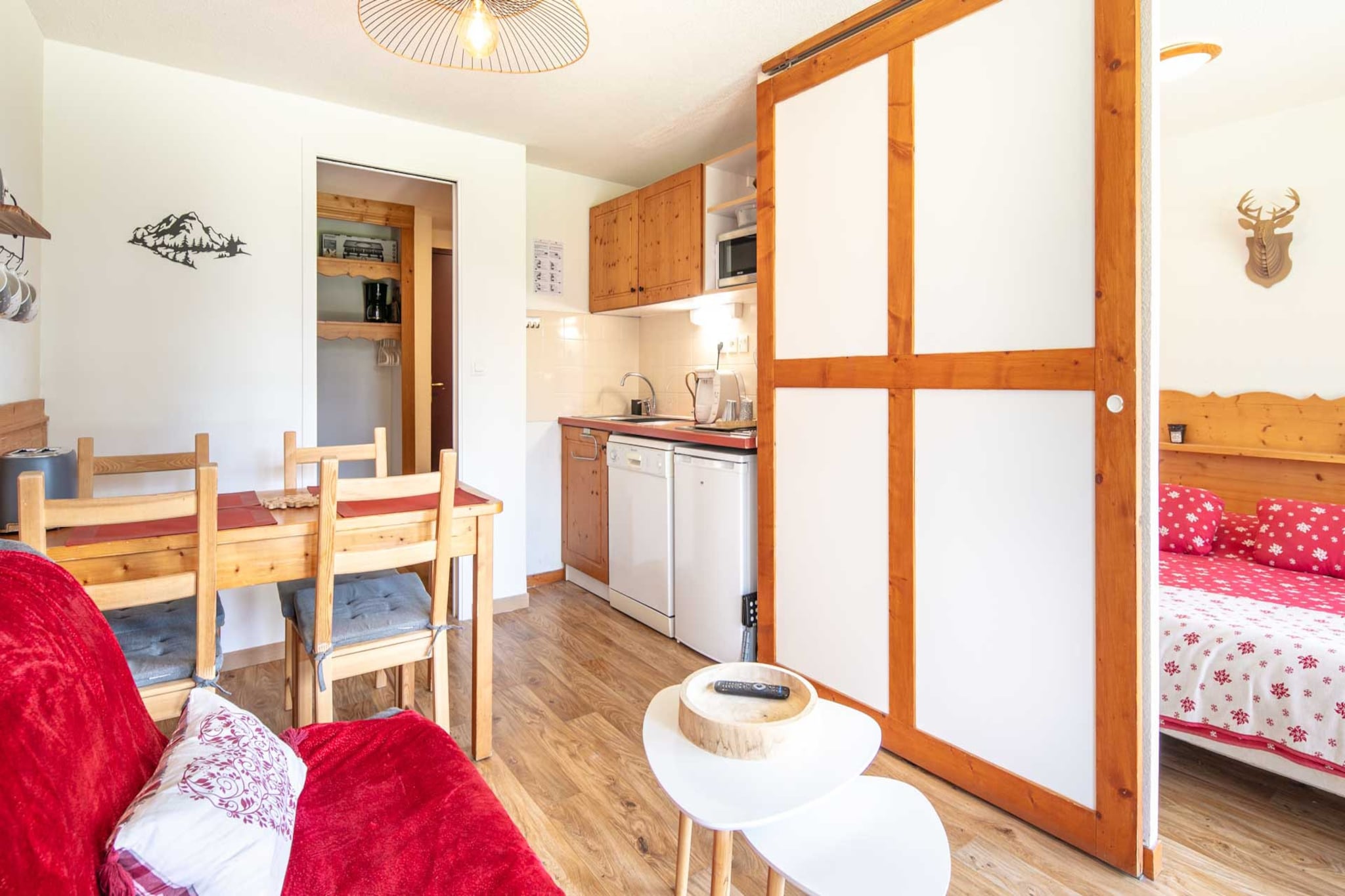 Living room(double sofa bed, bunk bed, TV), Kitchen(electric kettle, toaster, coffee machine, microwave, dishwasher, fridge, dishes and cutlery), bedroom(single bed, single bed), bathroom(bath tub), Garden Furniture , terrace, parking, hairdryer