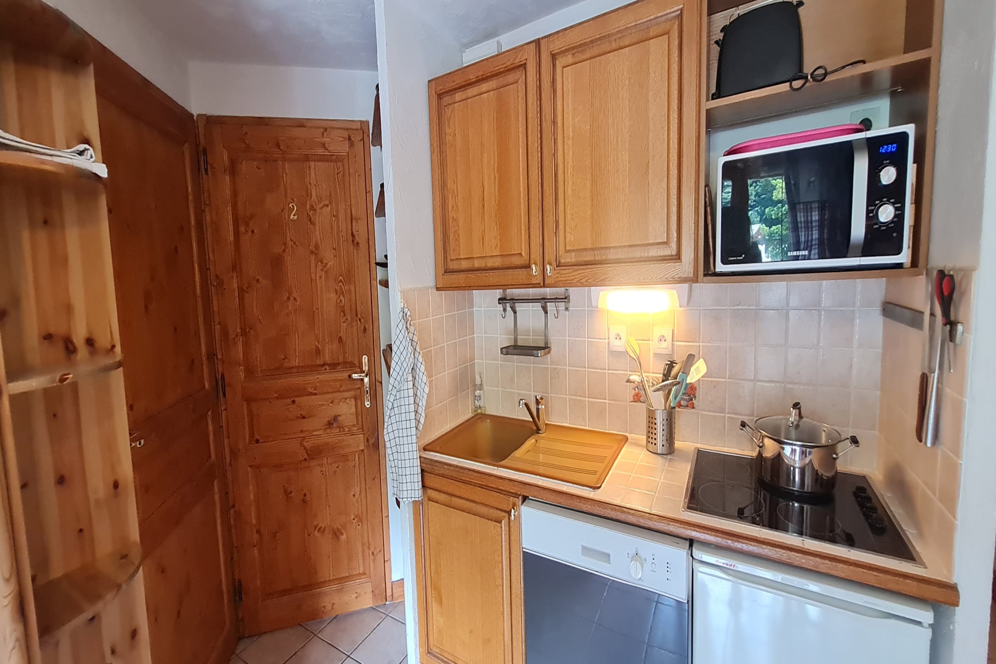 Living room(double sofa bed, TV), Kitchen(electric kettle, toaster, coffee machine, microwave, dishwasher, fridge, dishes and cutlery), bedroom(single bed, double bed), bedroom(double bed), bathroom(shower), Garden Furniture , washing machine, balcony, parking, iron, hairdryer