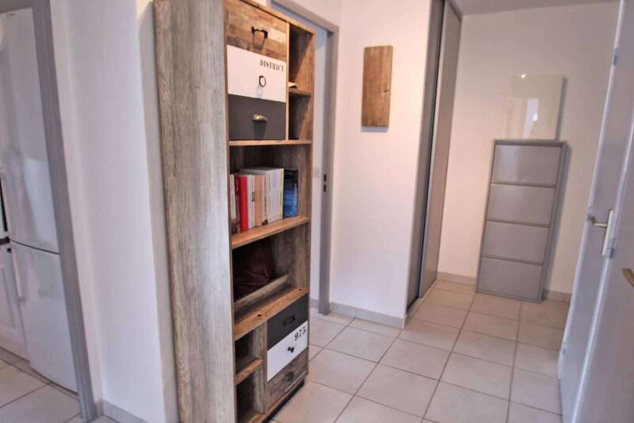 Elevator, Living room(double sofa bed, TV, dining table), Kitchen(electric kettle, toaster, coffee machine, oven, microwave, dishwasher, fridge, freezer, dishes and cutlery), bedroom(double bed), bedroom(bunk bed), bathroom(shower, washbasin), Parking, washing machine, heating, air conditioning, terrace, garden furniture, swimming pool(shared with other guests),