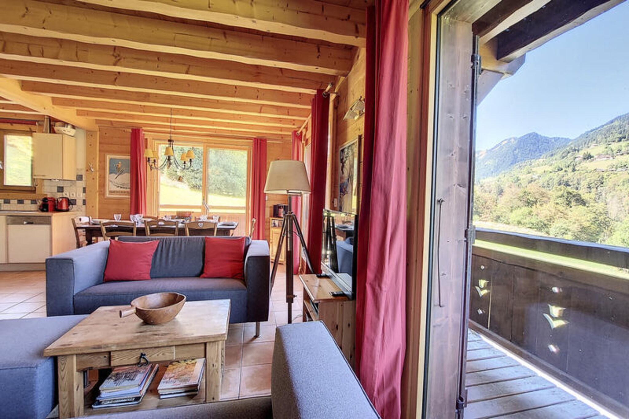 This charming 4-bedroom chalet, located in the peaceful village of Biot, can accommodate up to 10 people. The property features a variety of sleeping arrangements, including two bedrooms with single beds, a trundle bed, and ample storage space. It is pet-friendly, allowing guests to bring their pets, and offers a comfortable, cozy atmosphere. The chalet is well-equipped with essential amenities, including Wi-Fi, and a private parking space with a carport. Bed linen and towels are not provided, but duvets and pillows are available for all beds.
Situated in a quiet environment, the chalet offers breathtaking views of the surrounding mountains. It is close to local attractions, such as hiking trails and the vibrant village of Biot. The village offers various cafes, shops, and restaurants, providing guests with everything they need for a relaxing and enjoyable stay. The beautiful landscapes and outdoor activities make it an ideal location for nature lovers and adventure enthusiasts.
The chalet boasts a fully equipped kitchen with modern appliances, including a raclette machine and a fondue machine for cozy meals. The spacious living area is perfect for relaxing, with a comfortable seating area, a dining table, and a large bay window that opens to a south/west-facing terrace. Additional amenities include three bathrooms, one with a walk-in shower, and a separate toilet. The property also features a double garage with ski storage, ensuring convenience for winter sports enthusiasts.