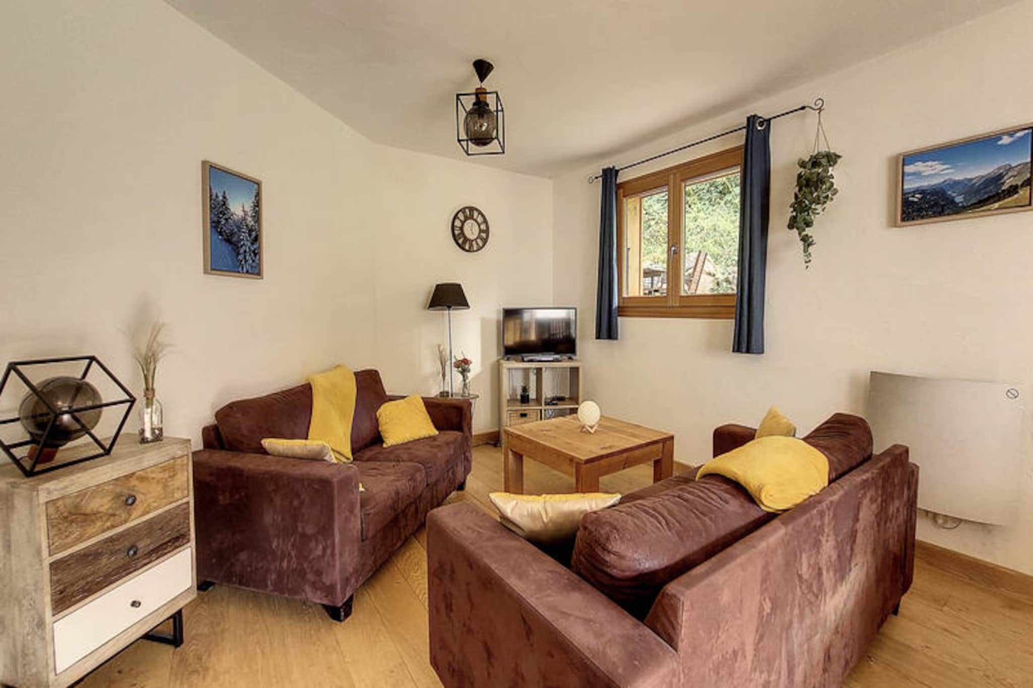 
This 72m² apartment is perfect for up to 5 guests, offering two bedrooms with a bunk bed, a single bed, and a double bed. It is not pet-friendly, and Wi-Fi is not available. The apartment provides duvets and pillows for all beds, but guests need to bring their own bed linen and towels. Two parking spaces are available in front of the building, and there is a ski/bike room and laundry area in the cellar.

The apartment is located in Morzine, with easy access to Avoriaz via a nearby shuttle. The area is home to a range of cafes, restaurants, and local shops, ensuring guests can easily explore the town. Ski slopes and outdoor activities are also within close reach, making this the ideal base for both winter and summer adventures.

Inside, the apartment features a fully equipped kitchen with induction hob, oven, microwave, dishwasher, and Nespresso coffee machine. A dining area with a wooden table and a living room with a smart TV and DVD player provide ample space for relaxation. The bathroom includes a bathtub, sink, toilet, and towel dryer. For outdoor enjoyment, a terrace with a table, chairs, and a barbecue is available during the summer months.