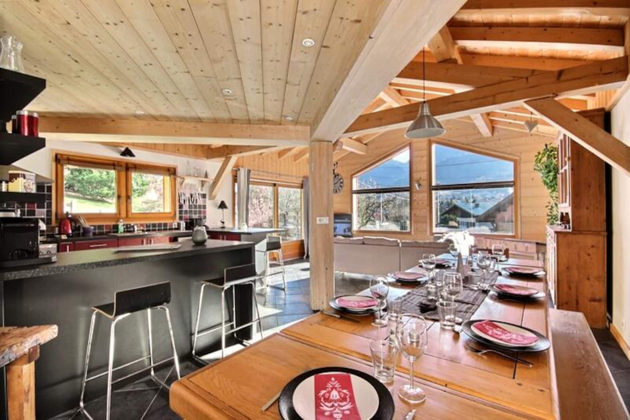 This spacious chalet, offering 202 m² of living space, accommodates up to 14 guests across six bedrooms. The chalet features a variety of sleeping arrangements, including double and single beds, as well as bunk beds for larger groups. It is equipped with modern amenities, such as WIFI, a TV, and a DVD player, but pets are not allowed. Guests can enjoy the comfort of a sauna, available daily from 6 p.m. to 9 p.m., and the property is designed with convenience in mind, featuring a ski room, laundry room with washing machine and dryer, and a double garage.
Situated in the picturesque village of Saint-Jean d'Aulps, the chalet is perfectly located in the heart of the Portes du Soleil ski area, offering easy access to a variety of winter sports. The village center is just 750 meters away, and a shuttle stop nearby provides transport to the Morzine ski resort. Guests will find cafes, shops, and restaurants within reach, making it ideal for a car-free stay. The surrounding area is also perfect for outdoor activities such as skiing, hiking, and mountain biking.
The chalet's fully equipped kitchen includes a 5-burner stove, refrigerator, freezer, dishwasher, and various small appliances, ensuring a comfortable stay. A dining area with seating for 12, along with a spacious living room, creates the perfect setting for family and friends to gather. Additional amenities include two bathrooms, a separate toilet, and a large northwest-facing garden with a trampoline and barbecue, making this chalet an excellent choice for both winter and summer getaways.