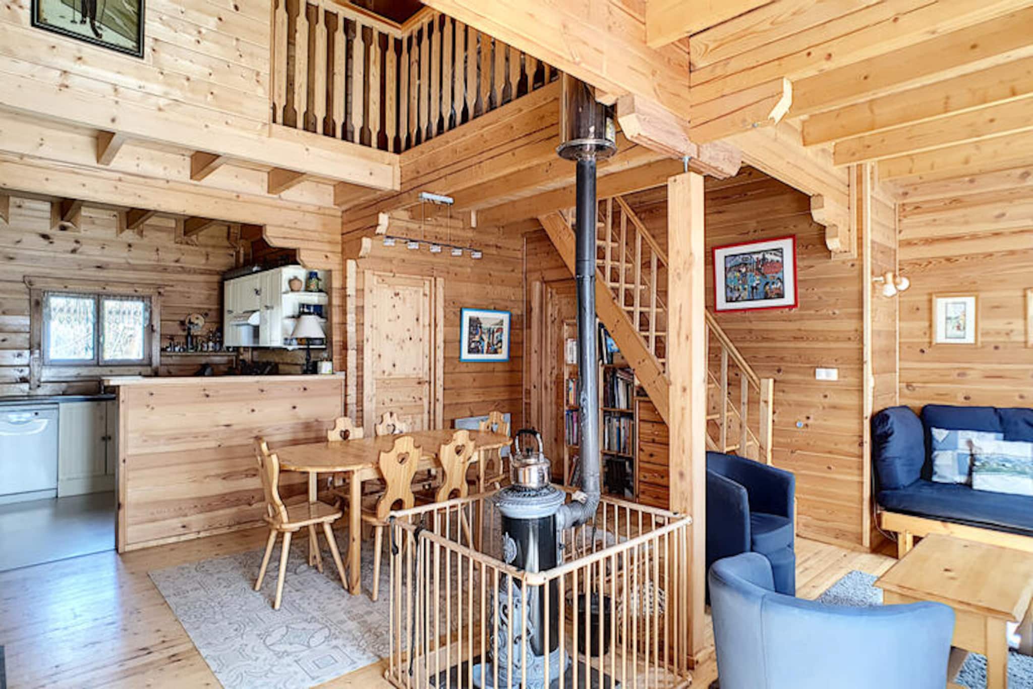 This spacious chalet offers accommodation for up to 8 people, featuring four comfortable bedrooms, including two with double beds and two with single beds. The property is pet-friendly upon request and includes duvets and pillows for all beds. However, bed linens and towels are not provided. The chalet is ideally located between shops, the village, and ski resorts, providing an excellent base for both winter and summer activities.

Guests will enjoy easy access to nearby attractions, including the Portes du Soleil ski area, just a short distance away by shuttle. The free shuttle to the Roc d'Enfer area is 100 meters from the chalet, while a paid shuttle to the Portes du Soleil area is only 200 meters away. The village of Saint Jean d'Aulps offers a variety of shops, restaurants, and cafes, making it a perfect destination for both relaxation and adventure. For outdoor enthusiasts, the nearby ski slopes and hiking trails provide year-round enjoyment.

The chalet is well-equipped for a comfortable stay, featuring a fully equipped kitchen with an oven, ceramic hob, microwave, dishwasher, and refrigerator. The living room is spacious, with a sofa, TV, DVD player, and wood stove, offering a cozy place to unwind after a day of exploration. There are two bathrooms, one with a bathtub and towel dryer. Additional amenities include a garage for ski equipment storage, a sunny terrace with garden furniture, a raclette machine, fondue machine, and washing machine. Private parking is also available.