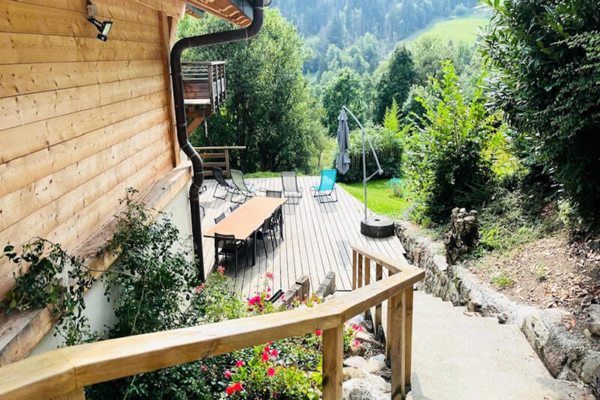 This spacious and modern chalet offers comfortable accommodations for up to 10 people with 4 bedrooms and 3 bathrooms. The chalet is perfect for families or groups, featuring two master suites with double beds and a large family room with a combination of double and single beds. The property is pet-free, ensuring a clean and allergy-friendly environment. Duvets and pillows are provided for all beds, but guests should bring their own bed linen and towels. A baby bed is available for younger guests, making it an ideal choice for families.

Nestled in a serene location near the Saint Guérin oratory, the chalet offers breathtaking views of the valley and surrounding mountains. It’s just a short 5-minute walk to the climbing wall and via ferrata, perfect for outdoor enthusiasts. Numerous hiking trails start directly from the chalet, making it a prime spot for nature lovers. The local area offers a peaceful retreat, yet it is close to the vibrant amenities of nearby Saint-Jean-d'Aulps, where guests can explore local cafes, restaurants, and markets, offering a taste of the region's charm.

The chalet is fully equipped for a comfortable stay, including a modern kitchen with a ceramic hob, dishwasher, fridge, oven, and microwave. The open-plan living and dining area boasts a spacious and bright environment with large windows that open to a 60m² wooden terrace, offering stunning views of the valley. The chalet also features a laundry room with a washing machine and ironing facilities. Additional amenities include Wi-Fi, a raclette machine, a fondue machine, and private parking spaces.



