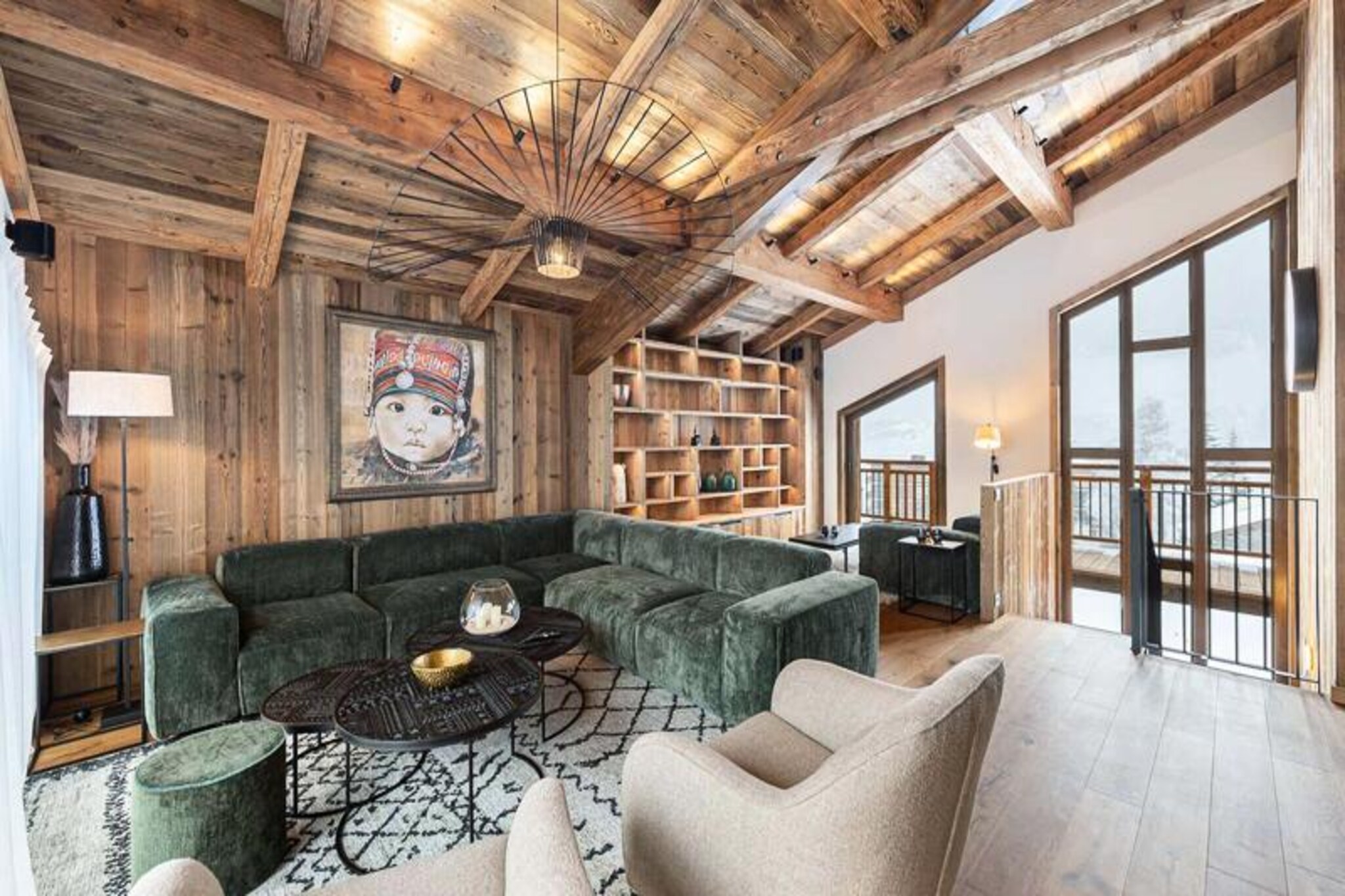 This luxurious 5-level chalet offers 6 elegantly appointed bedrooms, each with en-suite facilities, including twin or double beds and balconies for most rooms. The chalet accommodates up to 12 guests and features a ski room with a boot dryer, as well as a relaxation area with a swimming pool, sauna, and herbal tea room. Pets are welcome for a fee, and the property includes a safe for your valuables.
Nestled in the charming hamlet of Bois du Praz, just a short walk from Courchevel Le Praz village (400m), this chalet is ideally located close to local shops, restaurants, and cafes. Ski lifts, just 200 meters away, provide quick access to the slopes of Courchevel 1850, making this the perfect base for both relaxation and adventure. The village atmosphere offers a more peaceful retreat while still providing easy access to the main Courchevel resort.
Inside, the chalet features a spacious living room with a dining area, lounge with a fireplace, and a fully equipped open kitchen with a bar for casual dining. The reading room provides a quiet retreat, while the outdoor balcony and terrace allow guests to enjoy breathtaking views. Modern amenities include a TV room, laundry facilities, and a guest toilet, ensuring comfort and convenience throughout your stay.