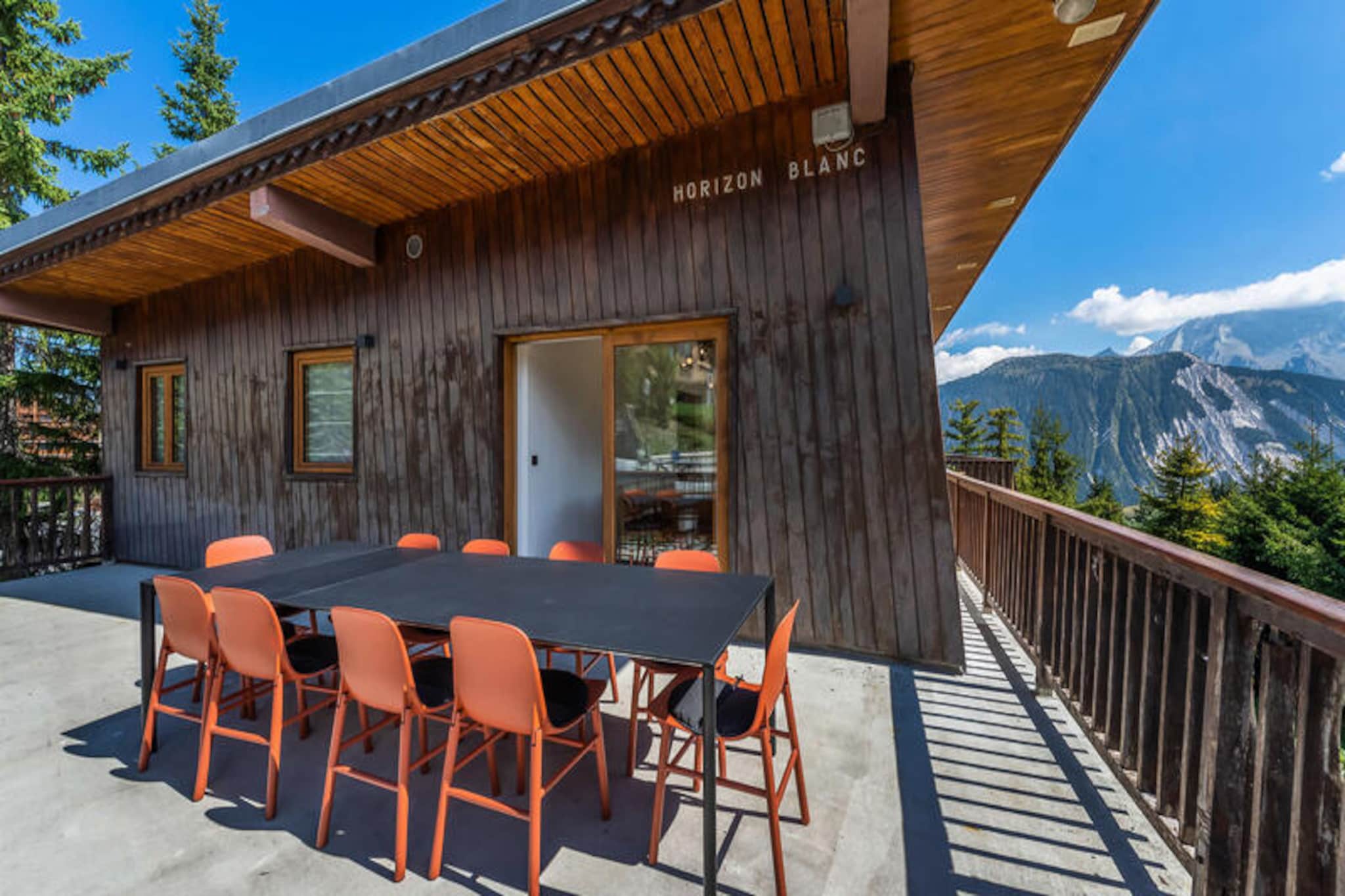 This 116m² apartment offers a comfortable stay for up to 6 guests with 3 bedrooms, each featuring a double bed and an en-suite bathroom with shower and toilet. The property is pet-free, ensuring a quiet and peaceful environment. The living and dining areas are furnished with a cozy fireplace, and two terraces offer stunning views of the surrounding peaks. The apartment faces southeast, filling the space with natural light, making it an ideal retreat for families or groups.
Located in the peaceful Nogentil district, this apartment offers a serene escape while being just 2.5 km from the center of Courchevel 1850. Ski enthusiasts will appreciate the ability to ski back from the Pralong slope, which is a mere 400 meters away. The village center, with cafes, restaurants, and boutiques, is just a short drive away, providing a perfect blend of tranquility and activity.
Inside, the apartment features a fully equipped kitchen for self-catering, along with a ski locker for storing your gear. Three en-suite bathrooms ensure maximum comfort, while separate toilets provide added convenience. Additional amenities include Wi-Fi, outdoor parking, and regular cleaning twice a week, along with wood for the fireplace, ensuring a warm, comfortable stay.