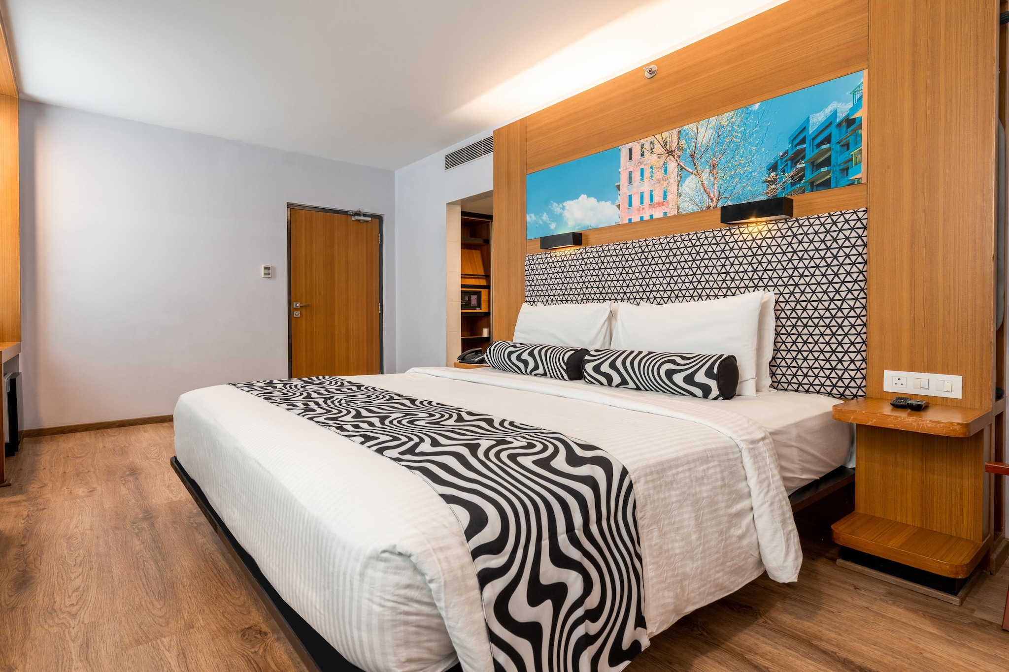 Welcome to Sunday Hotel Chandigarh Zirakpur - the city’s newest ‘Gateway to the Himalayas’! Located on the Ambala Chandigarh highway, the hotel is the perfect pitstop on your way to the hills. From here you can start your adventure to some of India’s most scenic hill stations from Kasauli to Naldhera. While you’re on your pitstop you can head to some of Chandigarh’s most iconic sites like the Rock Garden, Sukhna Lake, Rose Garden, etc.
Outdoor Pool Patio, flexible check-in, breakfast till 10 pm, signature cocktails, and more – we’re ready to reset your vacay!
Switch on DND mode as you unwind in spacious and comfy rooms with reset showers, a well-stocked minibar and other reset amenities.
Switch on reset with your reset key in any of our spacious 166 rooms that are equipped with all the modern amenities you'd need for a relaxing stay. Enjoy a steaming cup of tea or instant coffee from our complimentary tea and coffee kit. If hunger strikes, just scan all you want to order some yummy. After a long drive, reset with a reset shower and let your hair down with our wall-mounted dryers before sinking into our cosy beds. Make it cosier with Cloud 9, Zen Comfort, or Cuddle – our selection of soft and comfy named pillows.
Choose from two large Sunday Ballrooms – to host your parties, weddings, seminars and conferences. Or break-out in our smaller meeting rooms, cheekily named Monday, Tuesday, Wednesday, Thursday and Friday! You’ll soon also be able to host large gatherings at our upcoming outdoor event venue.
A 20-min drive from the international airport and a 25-min drive from the railway station, Sunday Hotel Chandigarh Zirakpur is just the perfect pitstop! For the more adventurous ones, take a road trip from Delhi with a stopover at the hotel before heading over to the most scenic hill stations like Kasauli, Shimla, Naldhera. You can also explore a few hidden gems like Nahan, Parwanoo, Morni Hills, Barog, Nalagarh and more. Or stay in the city a day longer and explore the city’s iconic sites like Nek Chand Saini's Rock Garden, Zakir Hussain Rose Garden and Sukhna Lake. Pro tip: Head to the legendary Pal Dhaba for some lip-smacking butter chicken!
Unmarried couples are warmly welcome at this property.
Guests with local ID proof are warmly welcome.
Apologies, but we are currently unable to host foreign nationals at this property.
Early Check-In Policy: A full day’s room rate will be charged for check-ins before 6:00 AM. Complimentary early check-in is available between 6:00 AM and 10:00 AM, subject to room availability.
Check-in is only available to guests aged 18 and above. Please provide a government-issued ID to confirm your age.