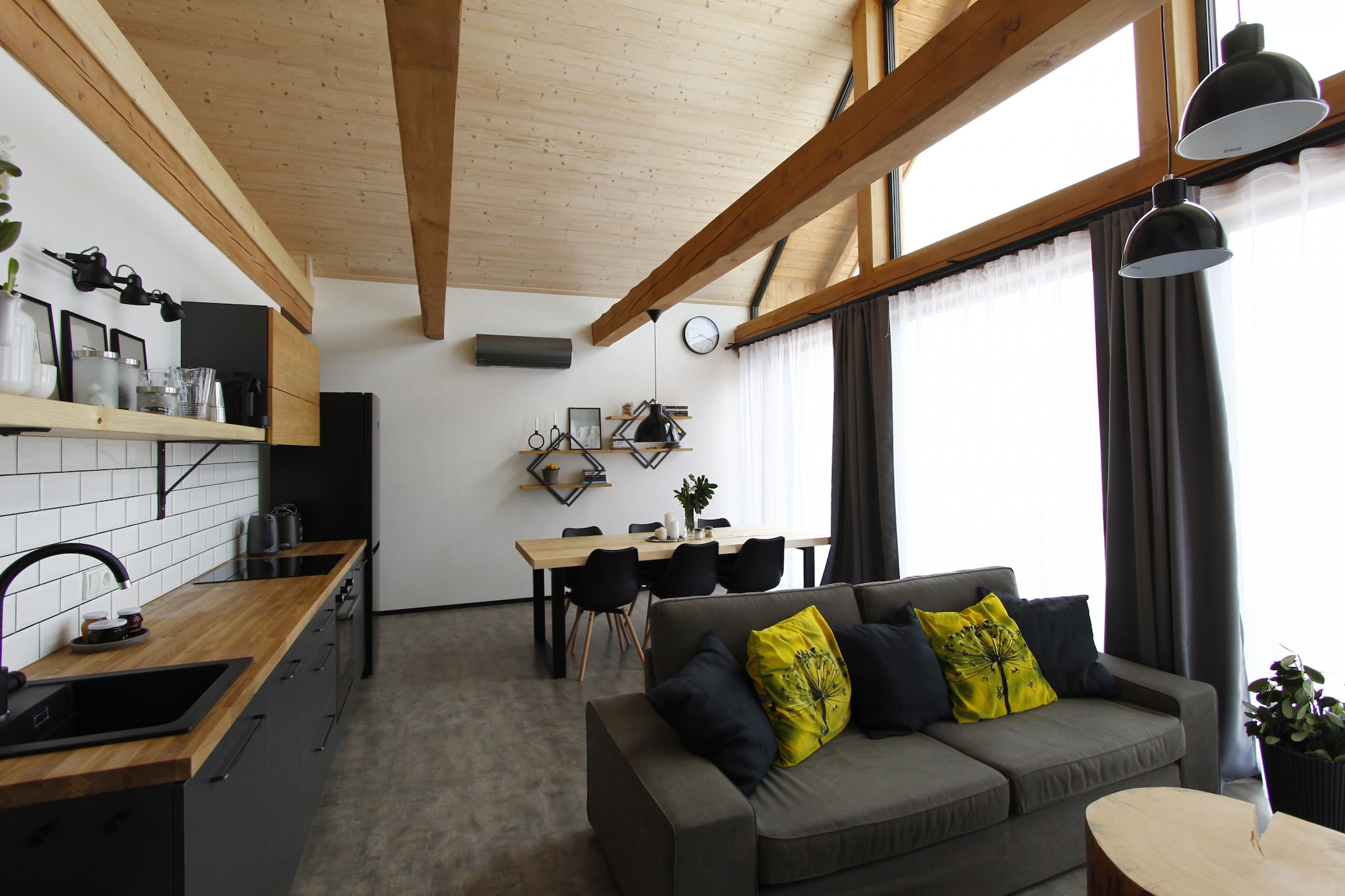 Nestled in the heart of the enchanting VysoÄina region, SmrÄek offers an unforgettable escape surrounded by natural beauty and rich cultural heritage. This charming village, known for its magical opal fields, is the perfect base for those seeking adventure and relaxation alike. Just a short distance from historic sites, it promises both tranquility and exploration, making it an ideal getaway for groups, families, or special occasions.
Our two modern houses, set in the middle of a peaceful orchard, offer spacious, stylishly designed apartments. Each house features four separate apartments, all designed with natural light and wood accents to blend seamlessly with the surroundings. Whether you’re looking for privacy in individual apartments or prefer to book the entire property for an exclusive experience, we’ve got you covered. Each apartment accommodates up to six guests and boasts comfortable bedrooms, a fully equipped kitchen, a cozy living area, and a private terrace to unwind after a day of exploration.
Beyond the comfort of your apartment, the property offers communal spaces designed for relaxation and fun. Enjoy a wine shop, beer tap, and a covered terrace perfect for socializing. Take a dip in the swimming pond, fire up the BBQ, or explore the surrounding area, rich with UNESCO World Heritage sites like ŽÄár nad Sázavou and the stunning PernÅ¡tejn Castle. Whether it's hiking, history, or cultural excursions, SmrÄek is your gateway to an unforgettable Czech experience.