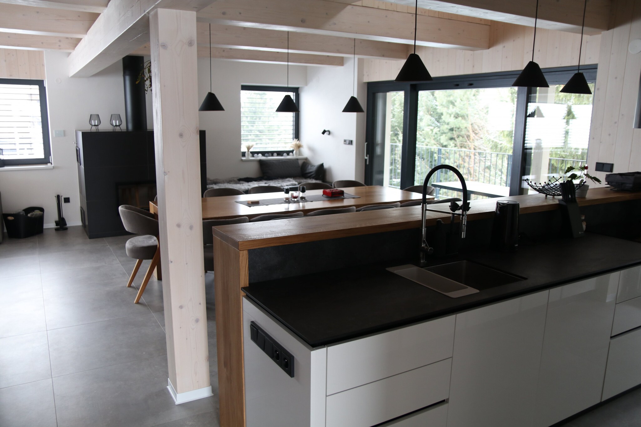 Looking for the ultimate vacation destination? Look no further! Nestled in the picturesque Dolnà Morava, this stunning villa offers a perfect retreat for up to 14 guests. With four spacious bedrooms and five modern bathrooms, everyone will have plenty of room to relax and unwind. Whether you're soaking up the sun by the pool, enjoying a rejuvenating sauna session, or simply relaxing on the terrace, this villa promises a memorable getaway all year round.
Located near the Sky Bridge and Kralický SněžnÃk, adventure awaits with hiking, paragliding, and thrilling experiences at the Vodnà and Adrenalin Park. For winter enthusiasts, the area offers excellent skiing at Dolnà Morava and VÄ›trný Vrch. Explore the charming villages, indulge in local cuisine, or simply enjoy the beauty of this serene location. Whether it’s summer or winter, this villa is the perfect spot for your next getaway.
The villa boasts a fully-equipped kitchen where you can prepare delicious meals, complete with an oven, microwave, fridge, and dishwasher. After a satisfying dinner, cozy up in the comfortable living room with a cup of coffee or tea, or curl up with a good book. On sunny days, enjoy the serene garden and take a refreshing dip in the pool. As evening falls, gather around the barbecue for a night of fun and relaxation by the fire, making memories with family and friends.