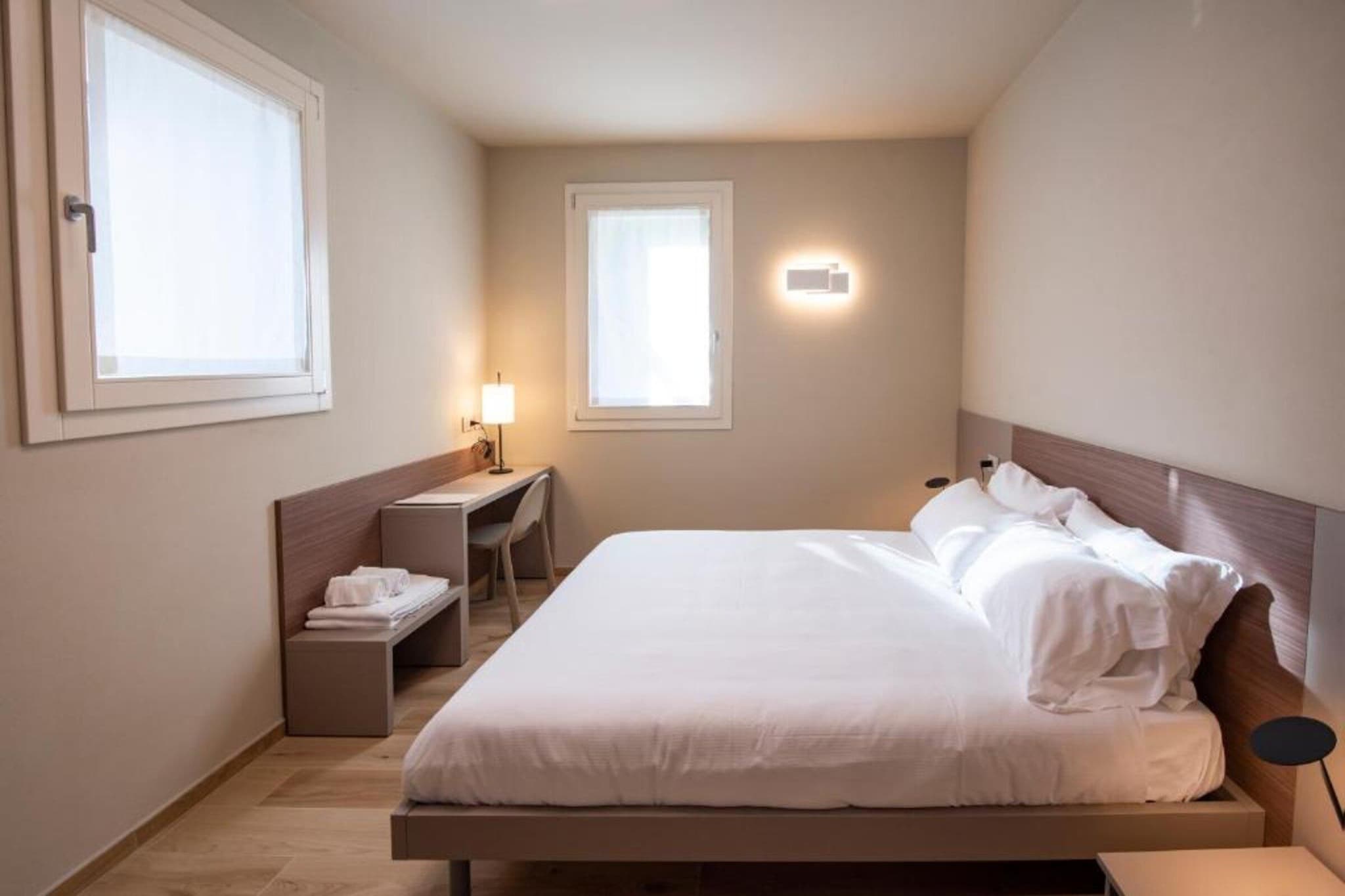 Ground floor: (Living room(double sofa bed, dining table), open kitchen(hob, coffee machine, oven, dishwasher, fridge-freezer), bedroom(double bed), bedroom(single bed(120 x 190 cm)), bathroom(shower, washbasin, toilet), balcony or terrace)\n\nBubble bath, sauna(paid), garden, parking