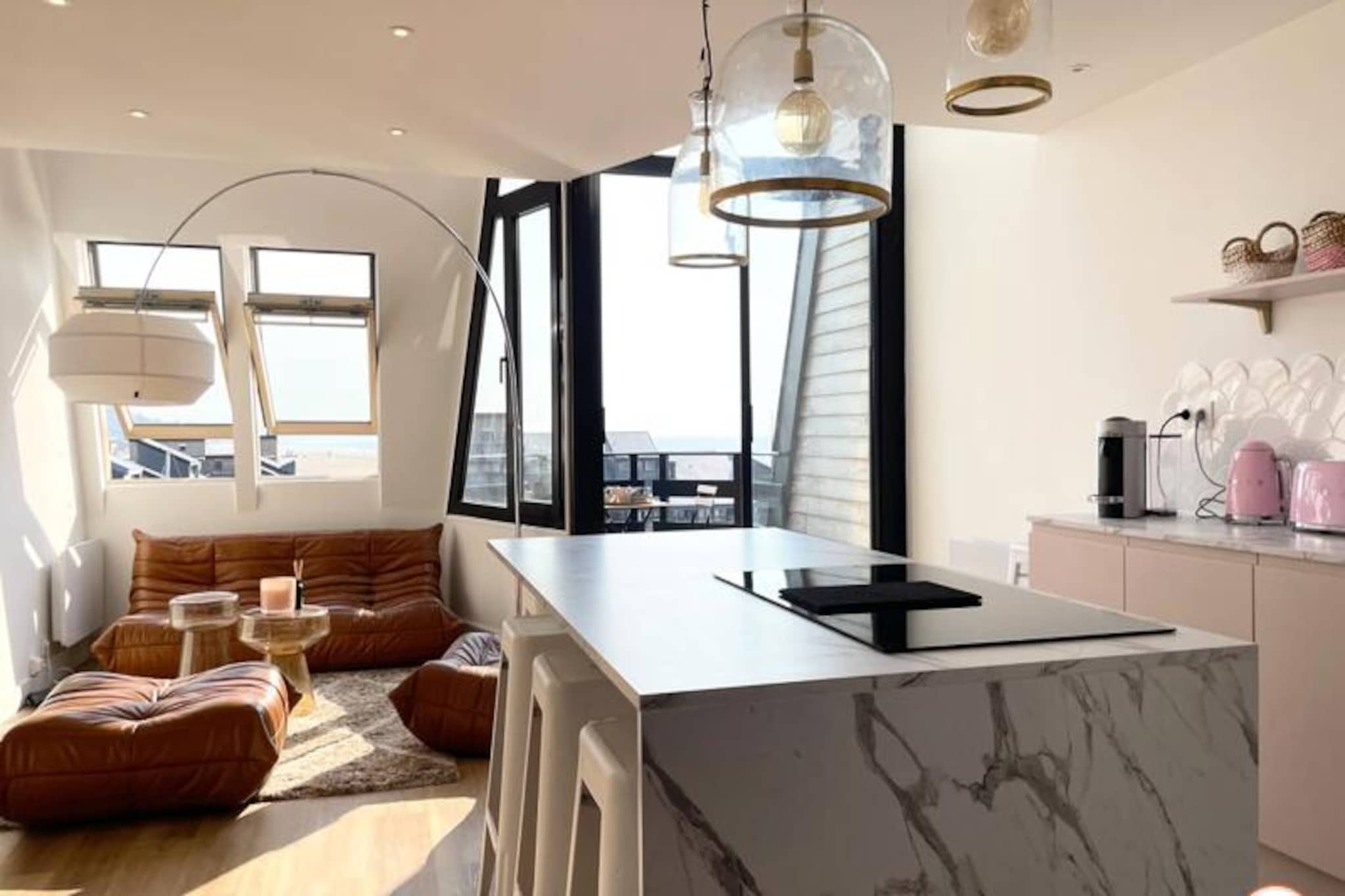 This stunning triplex is located in the heart of the Deauville marinas, offering panoramic views of the sea and Deauville beach. Renovated with contemporary charm, the apartment features three levels with three bedrooms (two doubles and one with bunk beds) and two bathrooms, including a luxurious double shower. Ideal for up to six guests, it boasts a spacious living area with a Smart TV, a balcony/terrace, and an open kitchen with a central island. Please note, pets are not allowed, and quiet hours are observed from 10 p.m. to 7 a.m.  

Situated within a secure luxury residence, this property is only a five-minute walk from Deauville's city center and casino. Explore the vibrant local area, including Touques and the port of Trouville-sur-Mer, while enjoying proximity to cafes, markets, and scenic seaside promenades. The location offers an idyllic balance of tranquility and access to lively attractions, all within a short walking distance.  

The apartment is well-equipped with a washer-dryer, dishwasher, iron, free Wi-Fi, and premium linens. A fully fitted kitchen, complete with modern appliances, makes meal preparation convenient. Additional amenities include a designated workspace, private parking upon request, and personalized check-in. Experience a seamless stay with concierge support and high-quality service in this exceptional Normandy retreat.