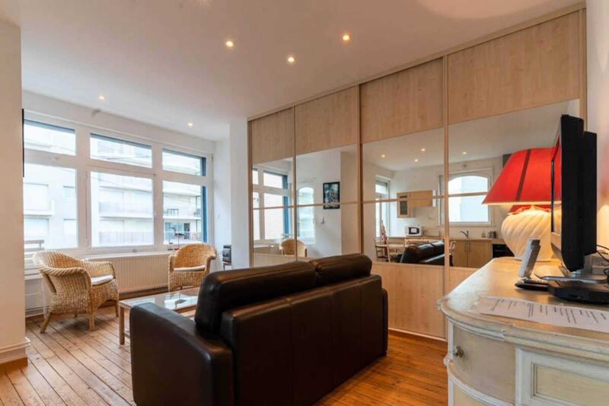 Nestled in the heart of the vibrant Atlantic district, this bright and airy apartment comfortably accommodates up to six guests, making it perfect for families or small groups. The property features a spacious living area with ample storage, a children’s room equipped with two sets of bunk beds, and a cozy bedroom with a platform double bed. A modern bathroom and separate toilet provide added convenience. Please note that linens and consumables are not provided but can be arranged upon request.

Situated just a short stroll from the seafront and 600 meters from the bustling market square, the apartment offers easy access to local shops, cafes, and restaurants. Explore the lively neighborhood, soak in the coastal charm, or venture further to discover cultural landmarks and attractions unique to the region. With free parking available during off-peak periods, exploring the surrounding areas is made simple.

The well-appointed kitchen is open to the living area, creating a warm and inviting space for shared meals and relaxation. Equipped with essential appliances and ample cupboards, it ensures a comfortable self-catering experience. Located on the first floor of a quiet building without an elevator, the apartment offers a peaceful retreat with modern amenities and personal support available throughout your stay.