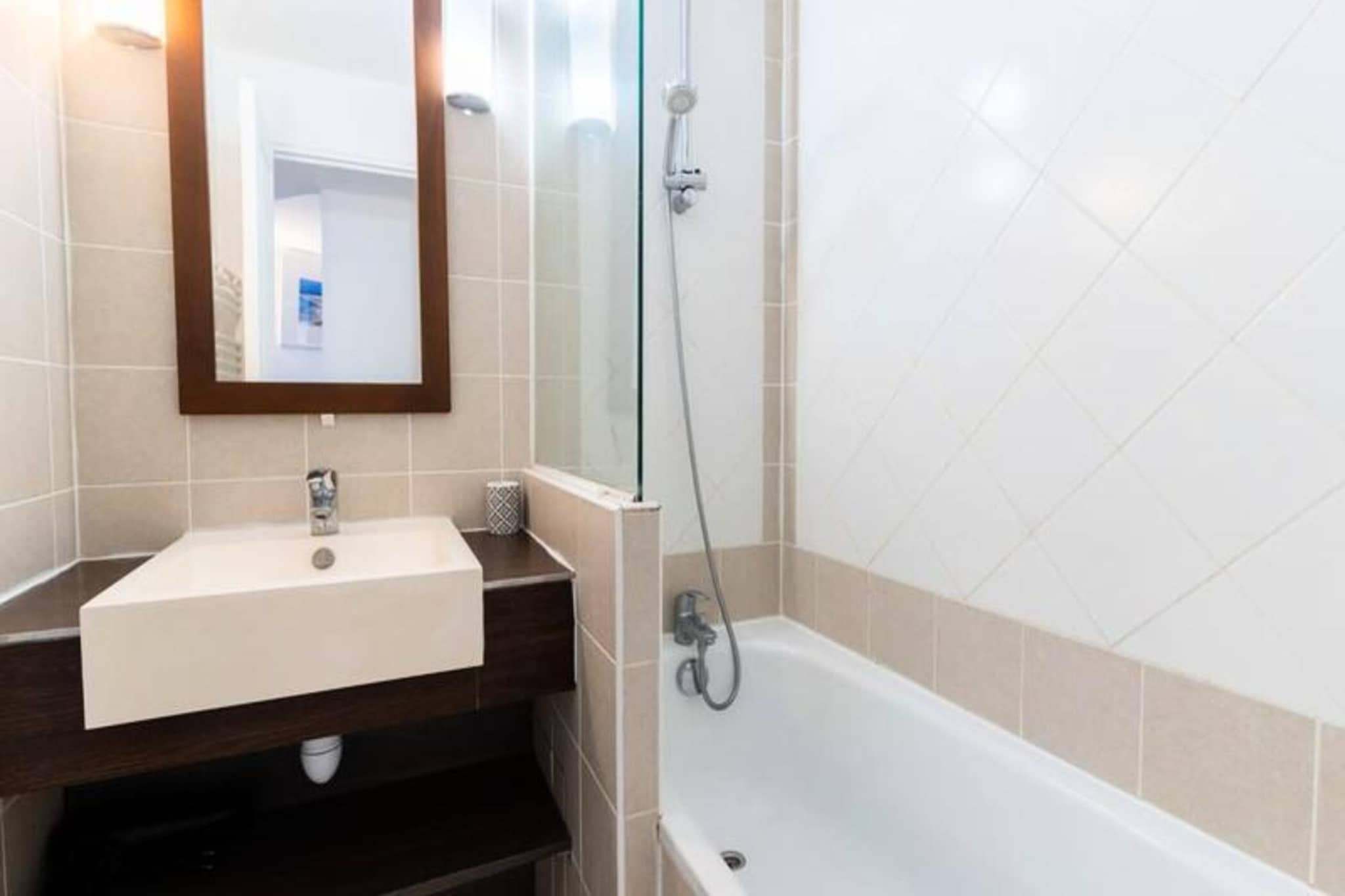 This delightful 2-room apartment accommodates up to 5 guests, making it an excellent choice for families or small groups. The apartment features a cozy living room with a 1.60 m sofa bed and dining area, complemented by an open kitchen. The separate bedroom includes bunk beds and a trundle bed, ideal for three guests. The property also offers free parking, access to a heated indoor swimming pool, and a pleasant balcony for relaxation. Please note that linens and consumables are not provided but can be arranged as optional services. Pets are not permitted in this accommodation.
Nestled in the heart of Le Touquet's equestrian park, this property provides a peaceful retreat with convenient access to local attractions. The nearby shuttle stop allows you to reach the vibrant city center easily, where you can explore charming cafes, shops, and markets. The residence's serene location offers stunning views of the equestrian park while being just a short distance from the bustling atmosphere of the city.
The apartment is equipped with a modern kitchen, including a dishwasher, TV, and coffee maker for added convenience. The bathroom features a bathtub and sink, with separate toilet facilities. Guests can enjoy the shared indoor heated pool, open throughout the year with scheduled closures. The concierge service is available for any inquiries during your stay. This well-appointed apartment ensures a comfortable and memorable holiday experience.