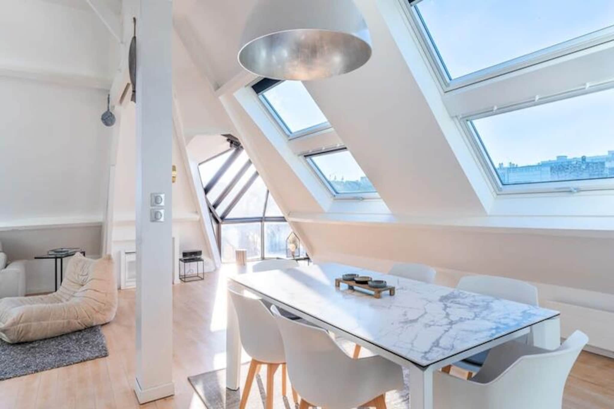 This stunning duplex apartment, located on the 3rd floor, offers a cozy retreat in the heart of the city. Accommodating up to six guests, it features two bedrooms: one with two double beds (160 cm each) and another with a single double bed (160 cm). The apartment boasts modern amenities, including air conditioning, WiFi, and a smart TV. A sleek bathroom with an Italian shower and a separate WC add to the comfort. Household linen, including sheets and towels, is provided, ensuring a hassle-free stay.

Nestled in the vibrant city center, the apartment places you within walking distance of bustling cafes, local markets, and charming boutiques. A short stroll reveals stunning sea views and a wealth of cultural attractions. Whether you’re exploring nearby landmarks or enjoying the local culinary scene, this location is ideal for immersing yourself in the area’s lively atmosphere.

The apartment’s fully equipped kitchen features an induction hob, traditional and microwave ovens, and a Nespresso coffee machine, perfect for preparing meals at your convenience. A laundry room with a washing machine and dryer adds to the practicality of this stylish space. Large windows flood the loft with natural light, offering a glimpse of the sea and creating a serene ambiance for a relaxing getaway.