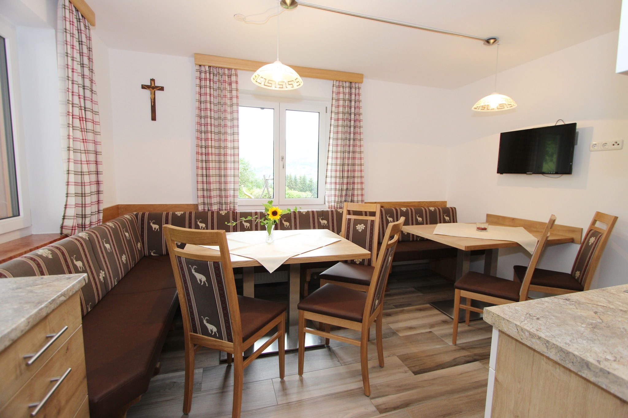 Located in a tranquil setting, this is a 4-bedroom apartment in Sankt Johann im Pongau. Outside, you will find a lovely terrace with outdoor furniture to enjoy meals and the beautiful view of the valley. 



The apartment has Alpine pastures and forests all around. There is a practice slope right next to the home, though without a lift, and also a toboggan run. You can reach the Salzburger Sportwelt ski area in no time if you get on the ski bus that stops 700 m away. While several restaurants are present at 2 km, the grocery stores and town center are 3 km away.



The ground-floor apartment has central heating. There is a modern living room with an open-plan kitchen, big enough for everyone to eat together. You can walk or rest in the sunshine in the shared garden. Children can romp to their hearts' content in the snow around the home. A sandpit play equipment, and table football setup is also present for kids. Parking is available.