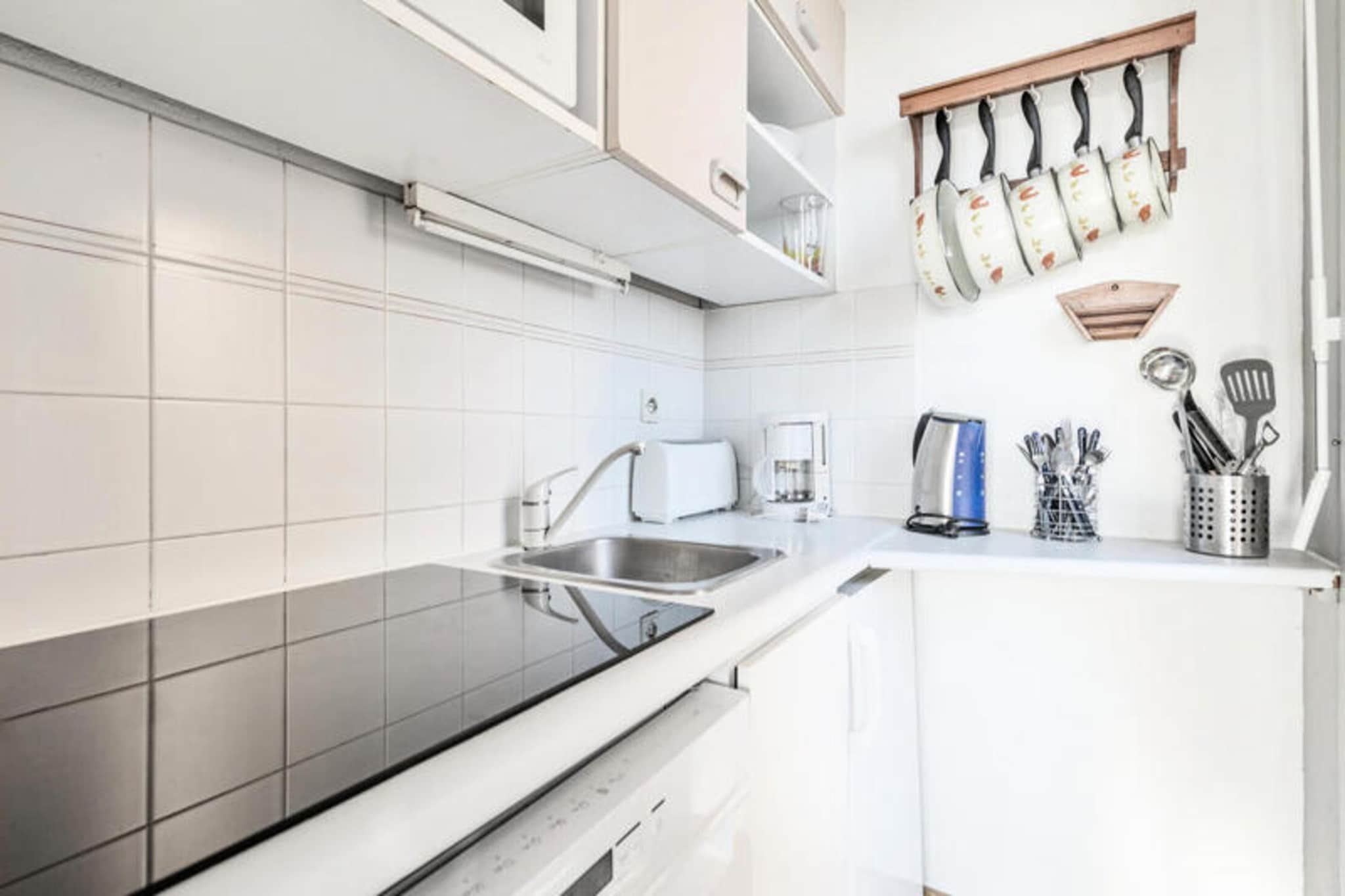 This cozy studio apartment, ideal for 4 people, is located in a residence offering direct access to the beach and Thalassotherapy center. The accommodation includes a living room with a convertible sofa bed, a cabin area with additional sleeping space, a fully equipped kitchen, and a bathroom with a separate toilet. The property is pet-friendly (subject to additional charges) and offers a private parking space for your convenience. Wi-Fi access is available for an additional fee, ensuring a comfortable stay for all guests.

The residence is perfectly situated just 600 meters from local shops, cafes, and markets. Guests can enjoy a variety of activities in the surrounding area, including nautical sports, tennis, horse riding, and golf at the nearby 9 and 18-hole courses. The nearby casino adds to the vibrant atmosphere of the area. With the Thalassotherapy center nearby, guests can also enjoy a range of wellness treatments, with special rates available for Maeva Home guests.

The apartment is equipped with all the essentials for a relaxing stay, including a kitchen with a microwave, refrigerator, and other appliances for meal preparation. The bathroom offers both a shower and toilet, and the space is complemented by additional amenities like a baby kit (subject to availability) and optional towel rental. Bed linen is available for an additional charge, and end-of-stay cleaning can also be arranged.