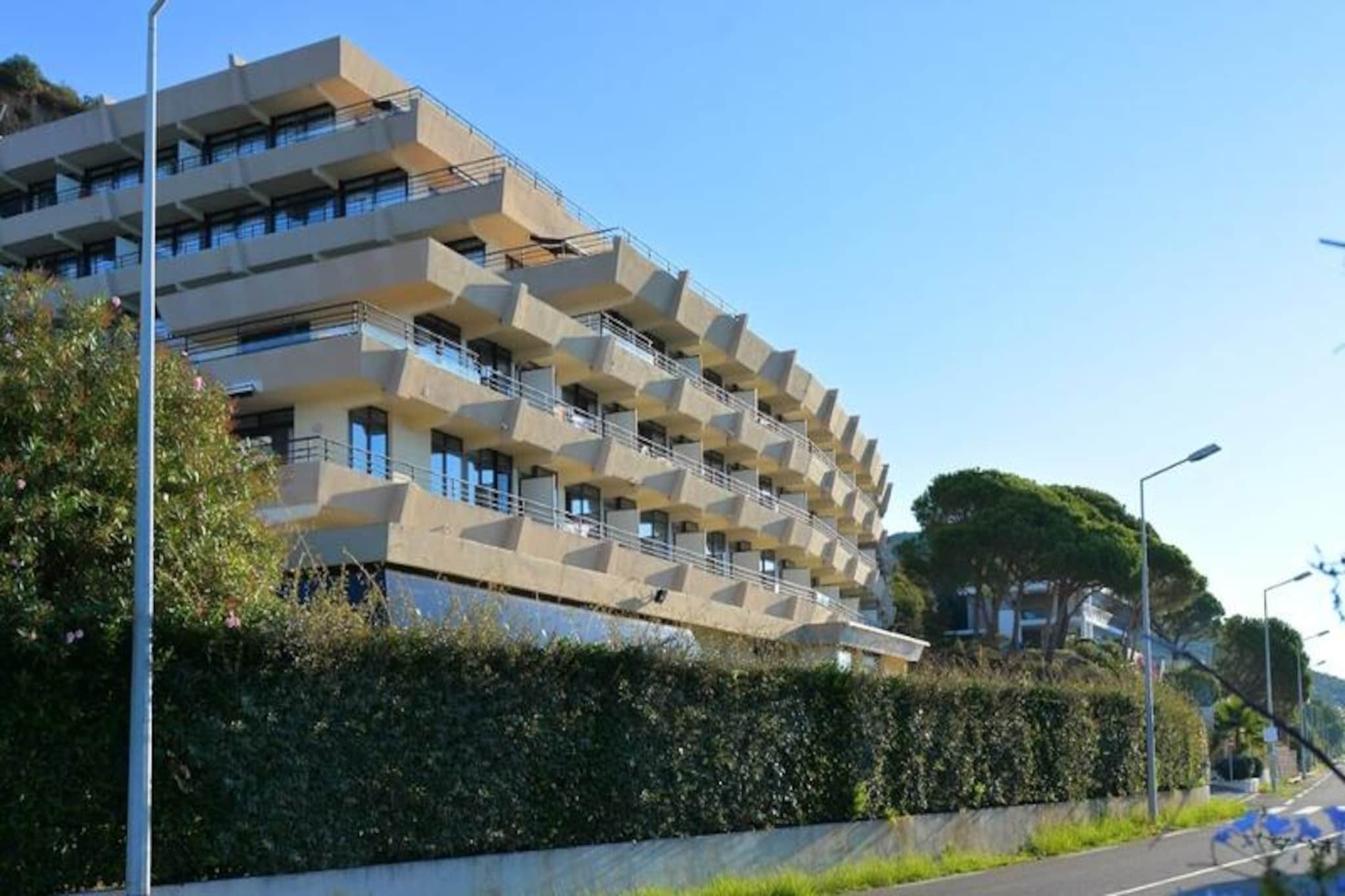 Perched on a picturesque hillside overlooking the Gulf of Ajaccio, this stylish retreat offers a perfect blend of comfort and tranquility. The property features a heated outdoor pool, fitness room, and wellness area, providing ample opportunities for relaxation. The accommodation includes a cozy studio with a double bed, a private balcony boasting breathtaking sea views, and free WiFi. Guests traveling with pets are welcome, with one animal allowed per stay for an additional fee. A continental breakfast is available daily, and covered parking ensures convenience throughout your visit.

Situated just 7 km from Ajaccio’s vibrant city center and a short distance from the famous Marinella beach, this residence is an excellent base for exploring local attractions. Enjoy the convenience of nearby cafes, markets, and cultural hotspots, or take in the beauty of the Sanguinaires Islands. With a white sandy beach just 100 meters away, guests can easily alternate between seaside strolls and urban excursions.

Each accommodation is designed with comfort and practicality in mind, featuring a fully equipped kitchenette, a modern shower room with a separate WC, and air conditioning. Sustainability is a key focus, with the property actively participating in eco-friendly initiatives to reduce environmental impact. Whether you’re here for leisure or business, this serene haven offers a harmonious setting for an unforgettable stay.