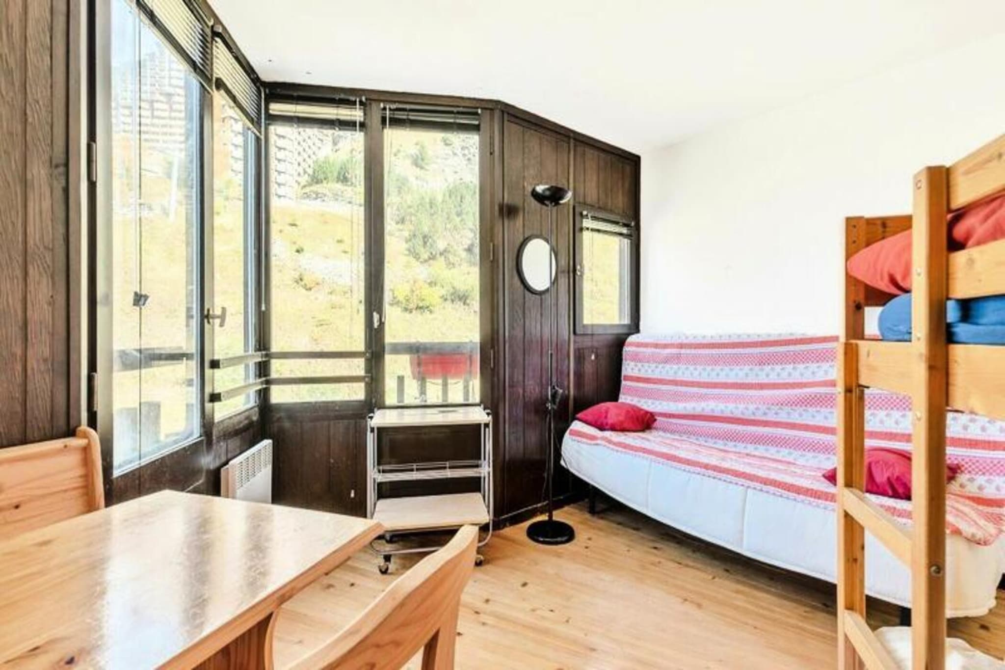 Set in the charming resort of Avoriaz, this cozy holiday home offers a warm and welcoming retreat in the heart of the Les Ruches district. Perfect for couples, the studio accommodates two people with a comfortable living space, kitchen, and private bathroom. The property is pet-friendly, allowing furry companions to join your adventure. Enjoy essential amenities like bed linens, a maintenance kit, and a stress-free stay with cleaning services available at an additional charge.

The residence is ideally located near the resort center, offering easy access to vibrant restaurants, shops, and local attractions. Families will appreciate the proximity to the children’s village, while adventure seekers can explore nearby skiing trails and hiking routes. The area also boasts a lively atmosphere with markets and cultural events to enhance your holiday experience.

Inside, the holiday home includes a well-equipped kitchen with essential appliances and a private bathroom for added convenience. Optional services, such as towel rentals, daily cleaning, and baby kits, ensure a tailored experience. Parking is available nearby by reservation, and tourist taxes apply for adults.