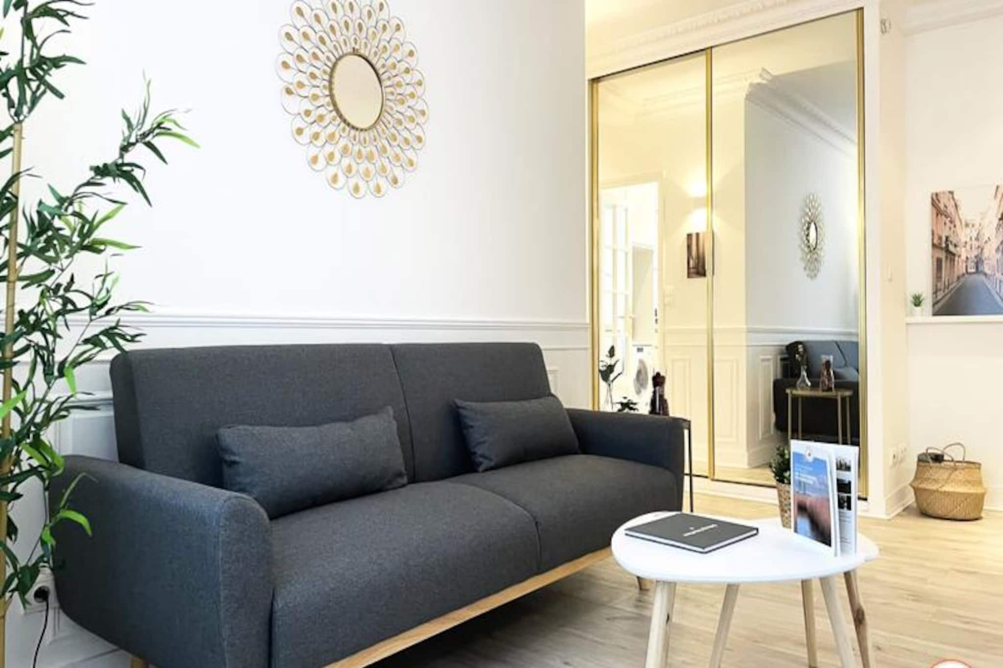 This charming apartment, ideally located in the heart of Caen, offers a cozy and comfortable stay for up to 3 guests. The bedroom features a quality double bed with ample storage space, while the living area includes a sofa bed, perfect for an additional guest. For added comfort, a mattress topper is provided. The apartment is non-smoking and does not allow pets. Bed linens, bath towels, Wi-Fi, and basic essentials like tea and coffee are provided for free, ensuring a relaxing stay.

The apartment is situated at the foot of the vibrant Quai Vendeuvre, with easy access to the city’s main attractions. It is just a short walk from the Leroy Tower, the Bernière/St Pierre Tram stop, and the city’s shops, gourmet restaurants, and cafes. The bustling city center, filled with historic sites and cultural spots, is just minutes away, offering plenty to explore and enjoy during your stay.

The apartment is fully equipped for a self-catering stay with an open kitchen featuring a refrigerator, oven/microwave, and coffee machine. The bathroom includes a shower and WC. While there is no private parking, paid parking options are available nearby. The property is perfect for both leisure and business travelers, with a dedicated workspace for telecommuting and a fully functional kitchen for cooking your meals.