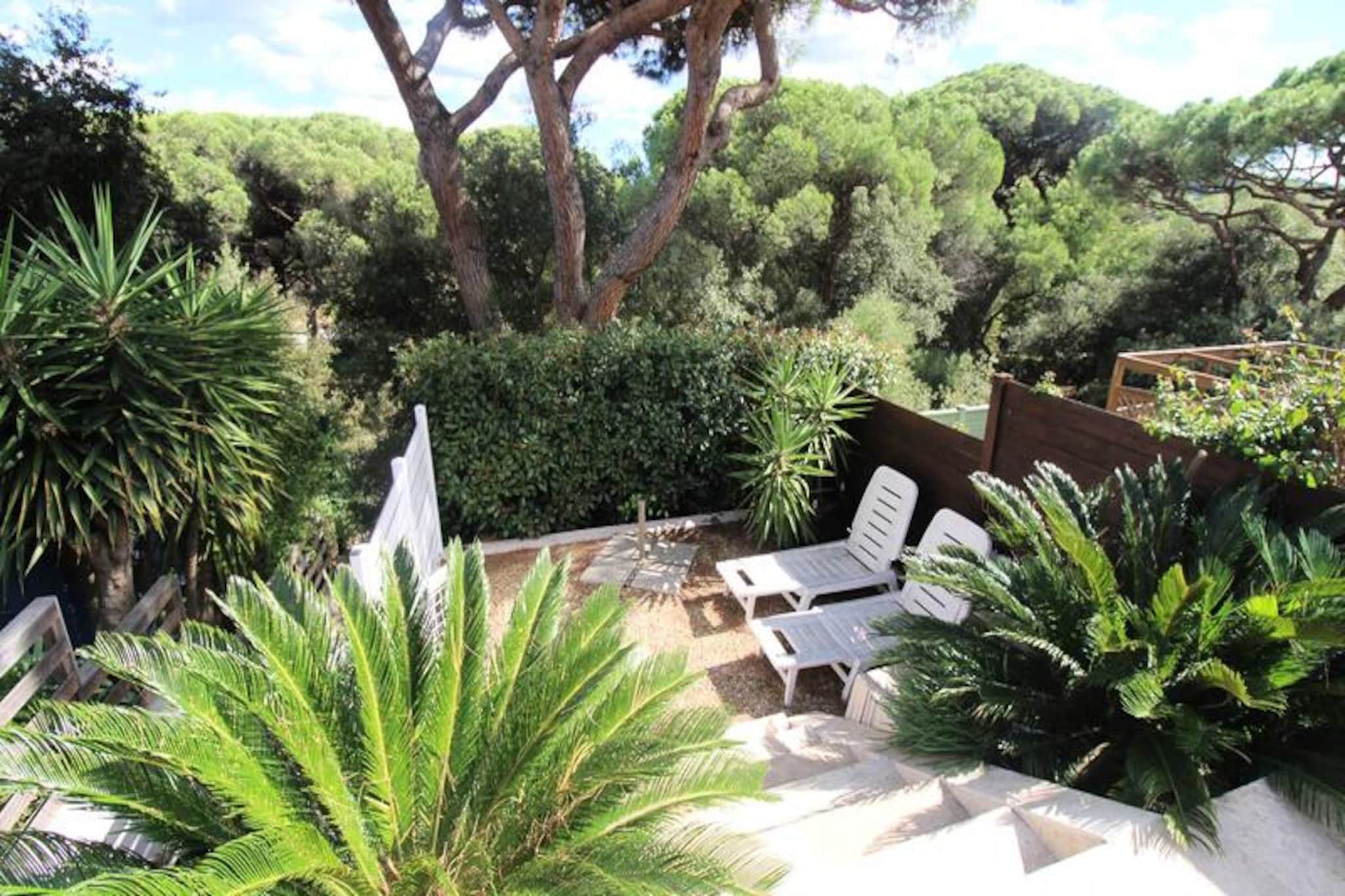 Escape to a serene holiday home nestled in the heart of a prestigious residence surrounded by a lush pine forest. This completely renovated T3 mazet offers a cozy retreat with a double bed in the main bedroom, two single beds in a sloping upper room, and a convertible sofa on the ground floor. Perfectly suited for families or groups of friends, this property provides a pet-free and tranquil environment. Guests can enjoy two communal swimming pools, a tennis court, and a private terrace with garden furniture, ideal for outdoor relaxation.

Located just 8 km from the vibrant town of Saint-Tropez and 11 km from the charming Sainte-Maxime, this holiday home provides easy access to pristine beaches only 3 km away. Explore nearby cafes, local markets, and shops, conveniently located within 1.5 km, ensuring you have everything you need for a memorable stay. The area offers plenty of opportunities for sightseeing, dining, and outdoor adventures.

Designed for your comfort, the property includes a fully equipped American kitchen with modern appliances such as an induction hob, oven, microwave, and dishwasher. Guests can also take advantage of amenities like free Wi-Fi, air conditioning, a flat-screen TV, and a washing machine. A walk-in shower and blackout curtains ensure restful mornings, while a private parking space adds to the convenience.