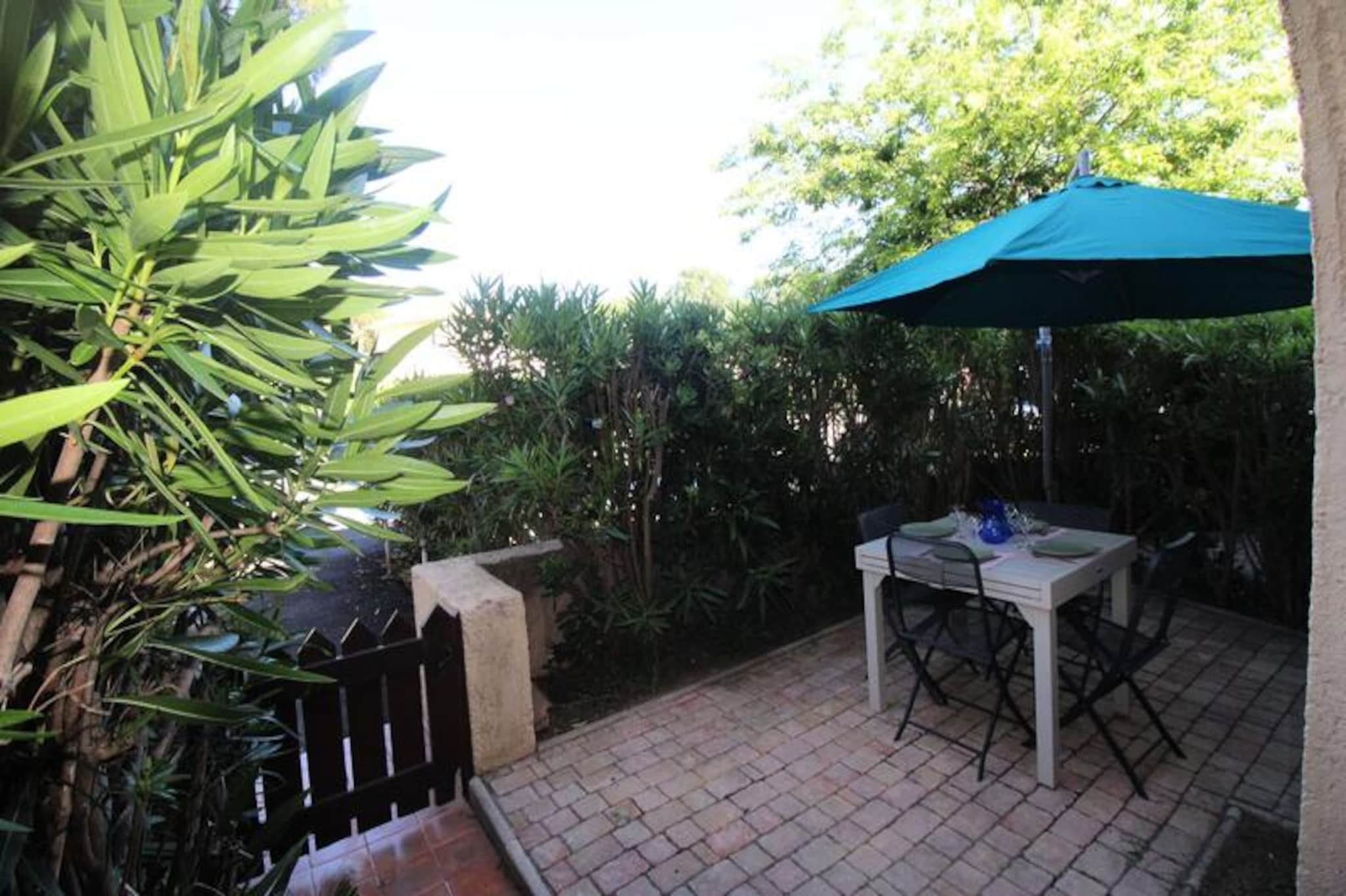 This charming ground-floor studio/cabin apartment, perfect for a couple with two children, offers a cozy and comfortable stay for up to 4 people. The apartment features a cabin with two single bunk beds, a bathroom, a separate toilet, and a living room with a convertible sofa and flat-screen TV. The American kitchen is fully equipped with a dining area, and the apartment has direct access to a private garden and terrace with outdoor furniture, ideal for enjoying the fresh air. The property is air-conditioned and offers a relaxing retreat near the beach.
Located just 150 meters from the beach, this apartment is in the ideal spot to enjoy the sun and sea. Restaurants and shops are within a 200-meter walk, providing easy access to local conveniences. The glamorous St-Tropez is just 5 km away, offering an abundance of attractions, cafes, and markets. Additionally, the residence features a large 650 m² lagoon swimming pool, open from May 23 to the end of September, and two tennis courts, making it a perfect location for both relaxation and recreational activities.
The apartment comes with a well-equipped American kitchen, including a dishwasher, washing machine, oven, microwave, hotplates, hood, Nespresso coffee maker, and kettle. For added convenience, there is Wi-Fi, an assigned parking space, and access to a swimming pool and tennis courts. Whether you're looking to cook a meal or relax by the pool, this apartment provides everything you need for a memorable stay.