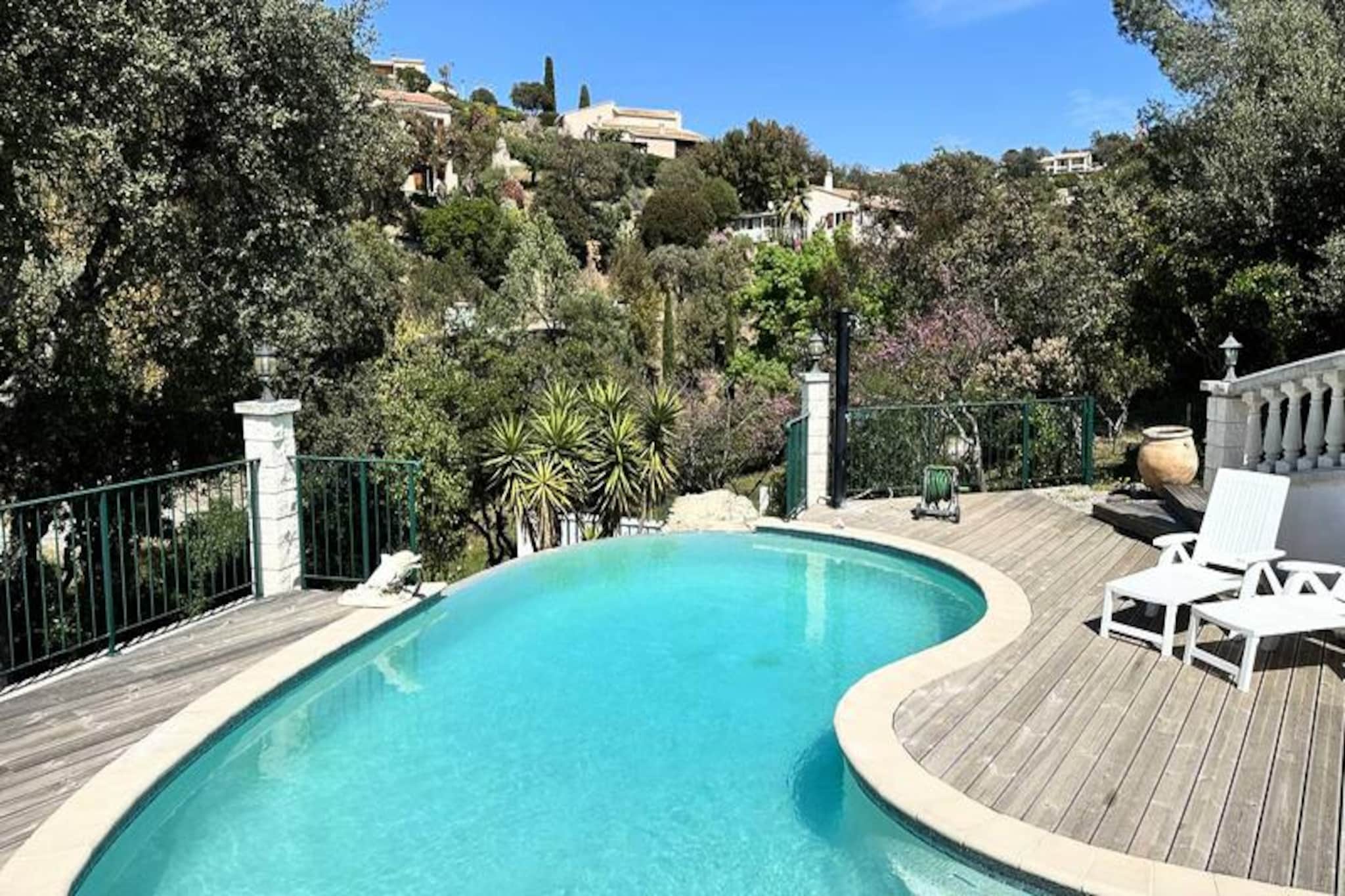 This Provencal-style villa offers a serene retreat with sweeping views of the surrounding hills and scrubland, just minutes from the stunning beaches of the area. Ideal for up to 8 guests, the villa boasts a beautiful swimming pool, multiple terraces, and a peaceful environment perfect for relaxation. Enjoy outdoor dining, sunbathing, or pétanque games while soaking in the panoramic views and the sounds of nature.

The villa is conveniently located near the magnificent beaches of Estagnol, Brégançon, and Pellegrin, and is just a short drive from the Valcros International Golf Club House. You’ll be well-placed to explore the region, with easy access to local attractions and activities. The pier for the island of Porquerolles is also nearby, offering a chance to explore the stunning island.

Spanning 240 m², the villa features two levels. On the main level, you'll find an open-plan kitchen, dining room, living room, and two double bedrooms. The lower level includes a studio with a kitchen and a bedroom, providing privacy for additional guests. The villa is fully air-conditioned, with ample parking for up to 3 vehicles.