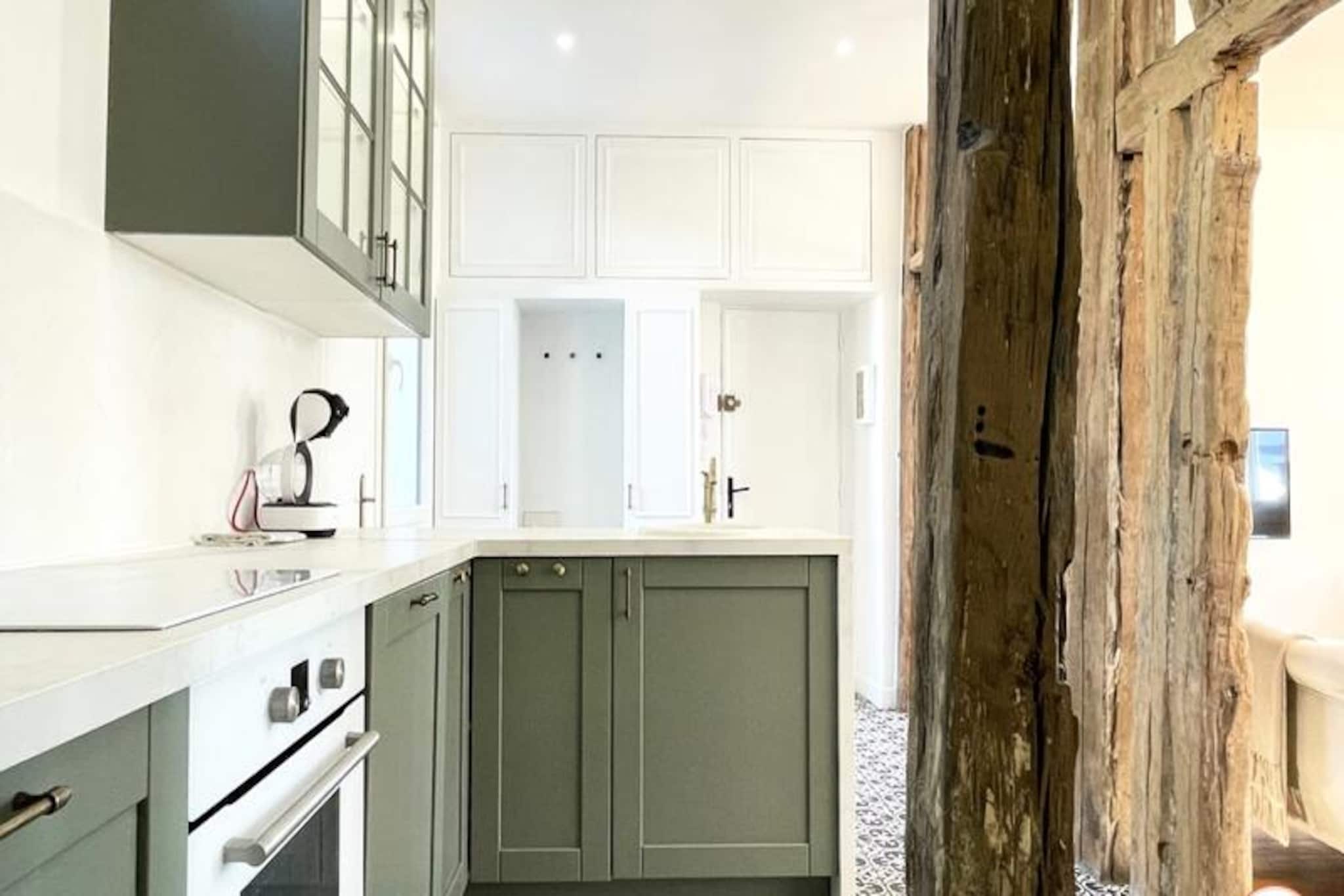 This charming apartment in the Saint François district offers a comfortable and modern stay, ideal for up to four guests. The property features two spacious bedrooms, each equipped with a luxurious Queen size bed, storage space, and soothing decor. A light-filled living area invites relaxation, while the separate WC and a stylish shower room ensure added convenience. Bed linens, bath towels, free WiFi, and household essentials like a washing machine and dishwasher are provided for your comfort. Please note that pets are not allowed, and the property is non-smoking.

Perfectly located, this apartment is steps away from the vibrant Fish Market and offers stunning views of the fishing port. Explore the cultural gems of Le Havre, including the nearby Shipowner’s House, MuMa museum, and the iconic Volcano district, all within walking distance. Numerous restaurants, cafes, and shops surround the area, adding to the lively neighborhood atmosphere. The marina and beach are easily accessible, offering options for leisure and exploration.

Designed with modern amenities, the open-plan kitchen features an oven, induction hob, fridge, and a Dolce Gusto coffee machine, catering to all your culinary needs. A bright living-dining area provides a cozy space for meals and relaxation. The apartment is on the first floor (stairs only) of a secure building, with parking available nearby. It’s an excellent base for exploring the region, from Deauville to Étretat, ensuring a memorable stay in Normandy.