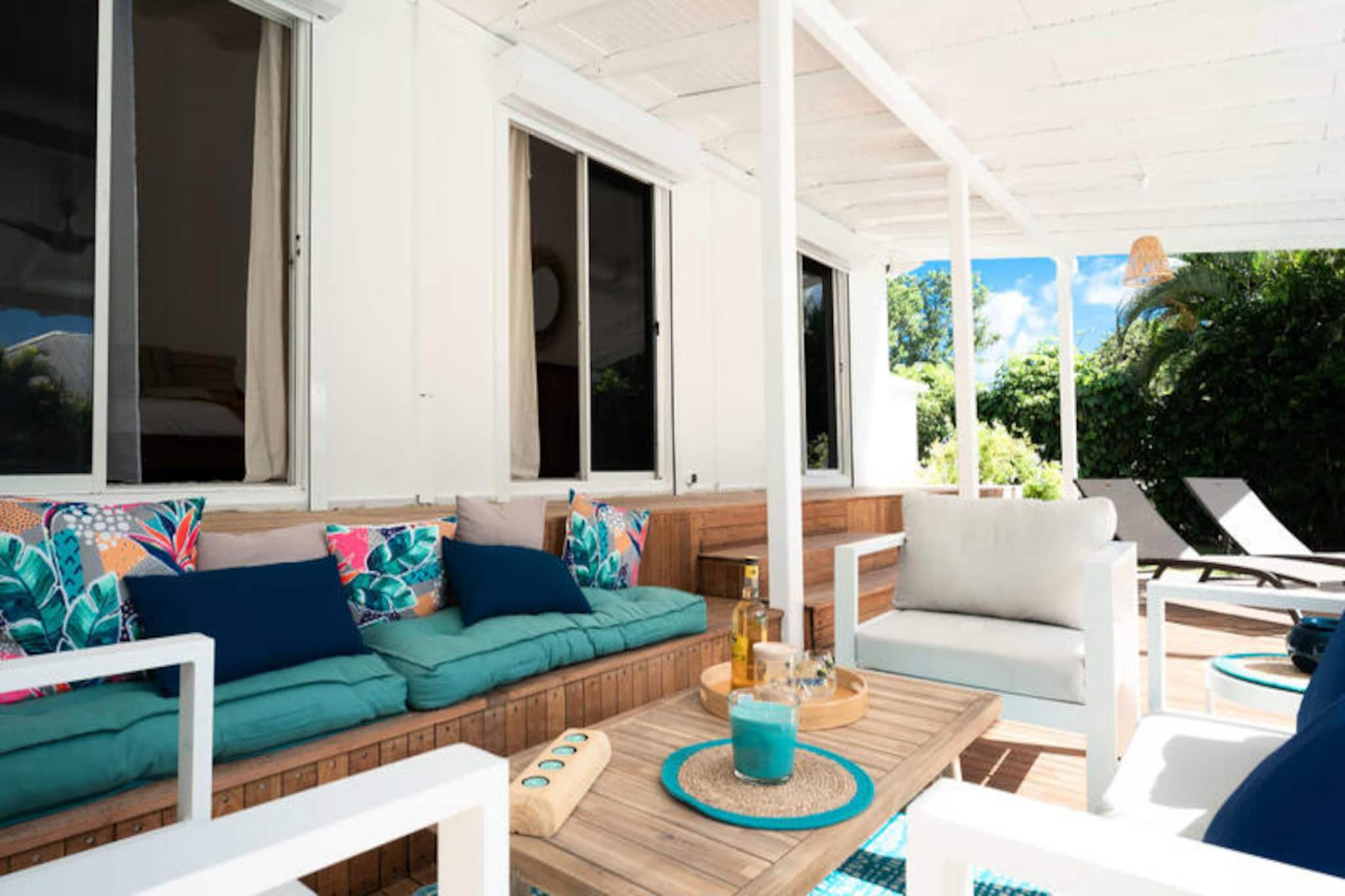 This beautifully renovated villa offers 4 air-conditioned bedrooms, perfect for families or groups. Three bedrooms feature 160 cm beds, and one has two 90 cm beds, accommodating up to 8 guests. The villa has 2 bathrooms and 3 toilets for your convenience. Guests can enjoy ample indoor and outdoor lounge and dining spaces, making it ideal for relaxation or gathering. The property is not pet-friendly, ensuring a peaceful environment for all visitors.

Located just 5 minutes from the stunning Raisins Clairs Beach and the renowned Saint-François International Golf Course, this villa is ideally situated to enjoy both relaxation and outdoor activities. The Saint-François Marina, with its shops and restaurants, is also within a short drive, while nearby beaches like Anse à la Gourde and Anse-Champagne offer opportunities for water sports, including Wing Foil rides. The Pointe-des-Châteaux, a famous local site, is only 10 minutes away by car.

The villa features a fully equipped American kitchen, opening to a spacious and comfortable living room. A covered outdoor terrace and BBQ area provide additional spaces for dining and relaxation, while the private swimming pool offers a refreshing escape. Other amenities include Wi-Fi, air conditioning throughout, towels and bed linen, and a water reserve system to ensure a continuous water supply.