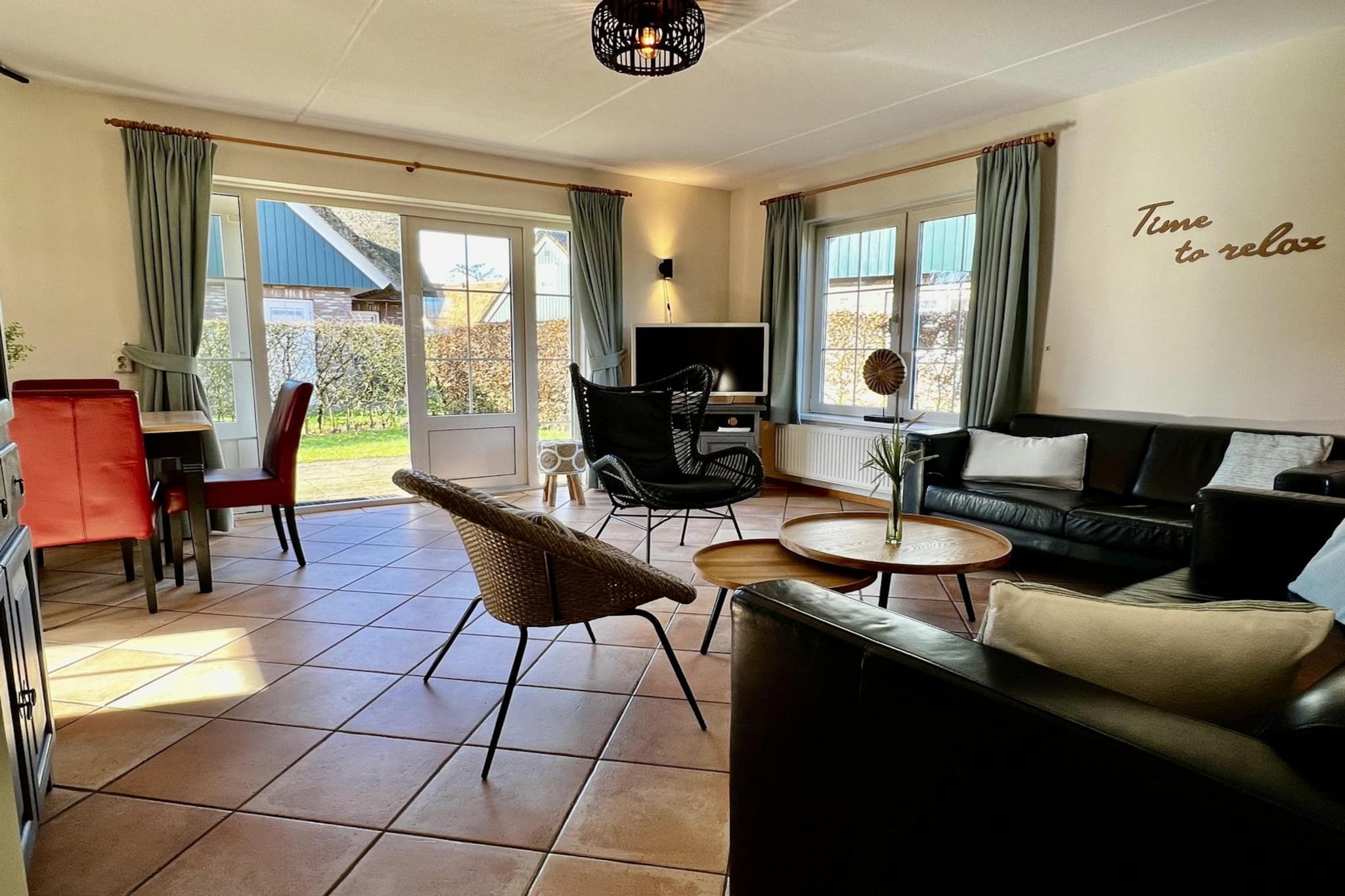 Escape to the tranquil villa in Sint Maartenszee, the ideal getaway for nature lovers and adventure seekers alike. Located just a 10-minute bike ride from the beach and a short walk to the forest, this charming retreat serves as a perfect base for cycling or walking holidays as well as rejuvenating weekend getaways. Immerse yourself in the beauty of the surrounding landscape while enjoying modern comforts.
Inside, the spacious living room welcomes you with tasteful furnishings, including two cozy sofas and an armchair, perfect for relaxing after a day of exploring. Gather around the generous dining table for six, or catch up on your favorite shows with cable TV featuring Dutch and German channels. The fully equipped open kitchen contains everything you need—dishwasher, filter coffee maker, kettle, 4-burner gas cooker, and microwave—ensuring hassle-free meal preparation. A utility room completes the space, featuring a washing machine and dryer for added convenience.
The property boasts three inviting bedrooms, including one on the ground floor with two single beds (80 x 200 cm) and a wardrobe. Upstairs, you’ll find a lovely bedroom with a double bed (180 x 200 cm) and another with two single beds (90 x 200 cm). An additional room houses a cot and extra storage. Guests can use ground-floor bathroom with a shower, toilet, and sink, plus a second toilet upstairs. Step outside to a sunny terrace surrounded by a beautiful garden, perfect for relaxing or dining al fresco. With free WiFi, one designated parking spot, and a strict no-pets policy, this retreat offers both comfort and tranquility. Please note that linen is not included but can be rented upon booking. Enjoy your serene stay!