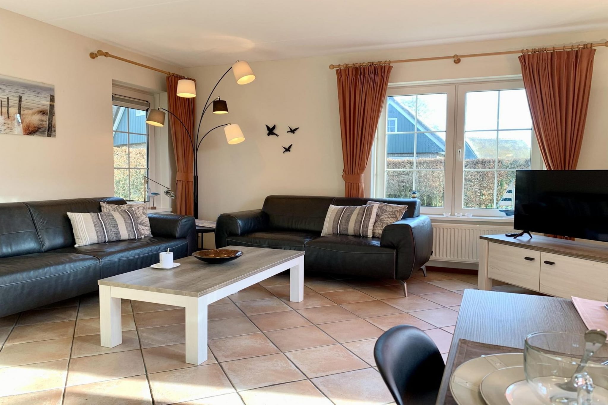 This cozy holiday home in a tranquil park offers a perfect retreat near the sea. The spacious living room features two comfortable sofas and cable TV with Dutch and German channels. The dining area includes a table for six, with a high chair available for families. The open-plan kitchen is fully equipped with modern appliances, including a dishwasher, microwave oven, gas stove, filter coffee maker, and kettle. A washing machine and dryer are conveniently located in the utility room. Upstairs, the home has three bedrooms—two with double beds and one with two single beds—each furnished with ample wardrobe space. A cot is also provided, though guests must bring their own cot linen.
Surrounded by nature, the home is ideally located just 10 minutes by bike from the beach and a short walk from the forest, making it perfect for cycling and hiking enthusiasts. Nearby attractions include local cafes and markets that provide a taste of the region. Seasonal bulb fields in spring create a breathtaking landscape.
Enhance your stay with a private 4-person infrared sauna, perfect for relaxation or therapeutic use. Step into the sunny garden with a landscaped terrace and outdoor furniture, ideal for unwinding. Electric or gas barbecuing is permitted, and one parking space is available at the property, with additional parking nearby. Free Wi-Fi is included, and guests must bring or rent their own linen. Please note that pets and electric car charging from the property are not permitted.
Note: The bed linen is optional and available for € 13 p.p./Stay.