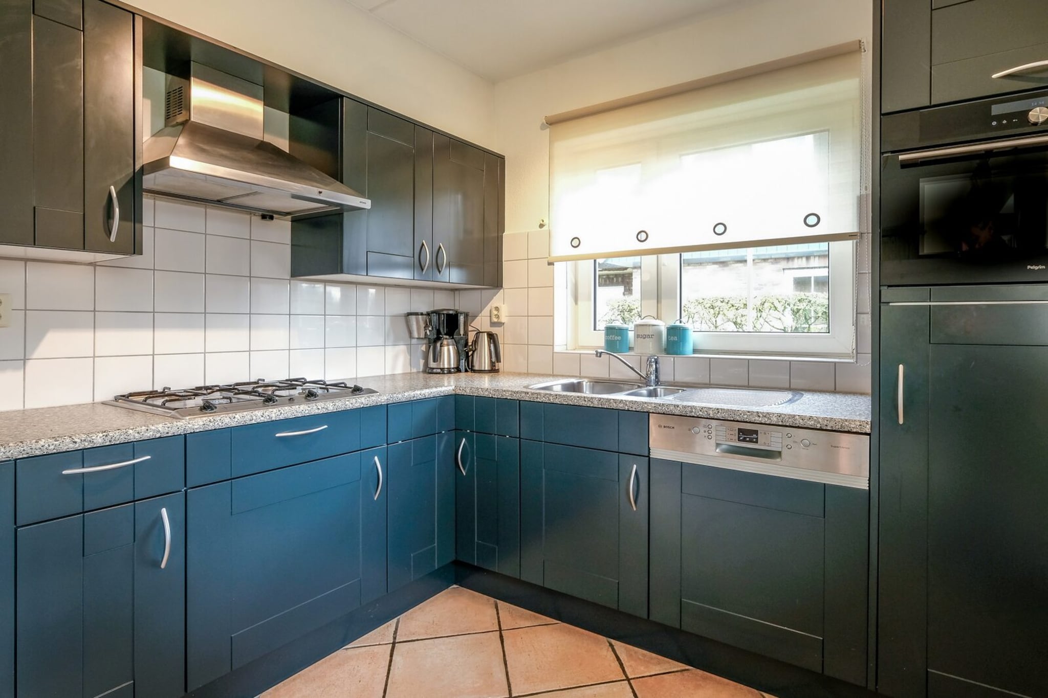 Ground floor: (Living room(TV(cable, flatscreen), seating area), dining room(dining table(6 persons)), open kitchen(stove(gas), electric kettle, toaster, coffee machine(filter), combination microwave, dishwasher, fridge-freezer), bedroom(single bed(duvet, 80 x 200 cm), single bed(duvet, 80 x 200 cm)), bathroom(shower, washbasin, toilet))\n\nOn the 1st floor: (bedroom(double bed(twin duvet, 160 x 200 cm)), bedroom(single bed(duvet, 90 x 200 cm), single bed(duvet, 90 x 200 cm)), toilet(toilet))\n\ntumble dryer, cot, washing machine, garden doors, patio, terrace, garden, garden furniture, BBQ, parking, high chair, stair gate, ironing board, iron, Charging post for electric cars