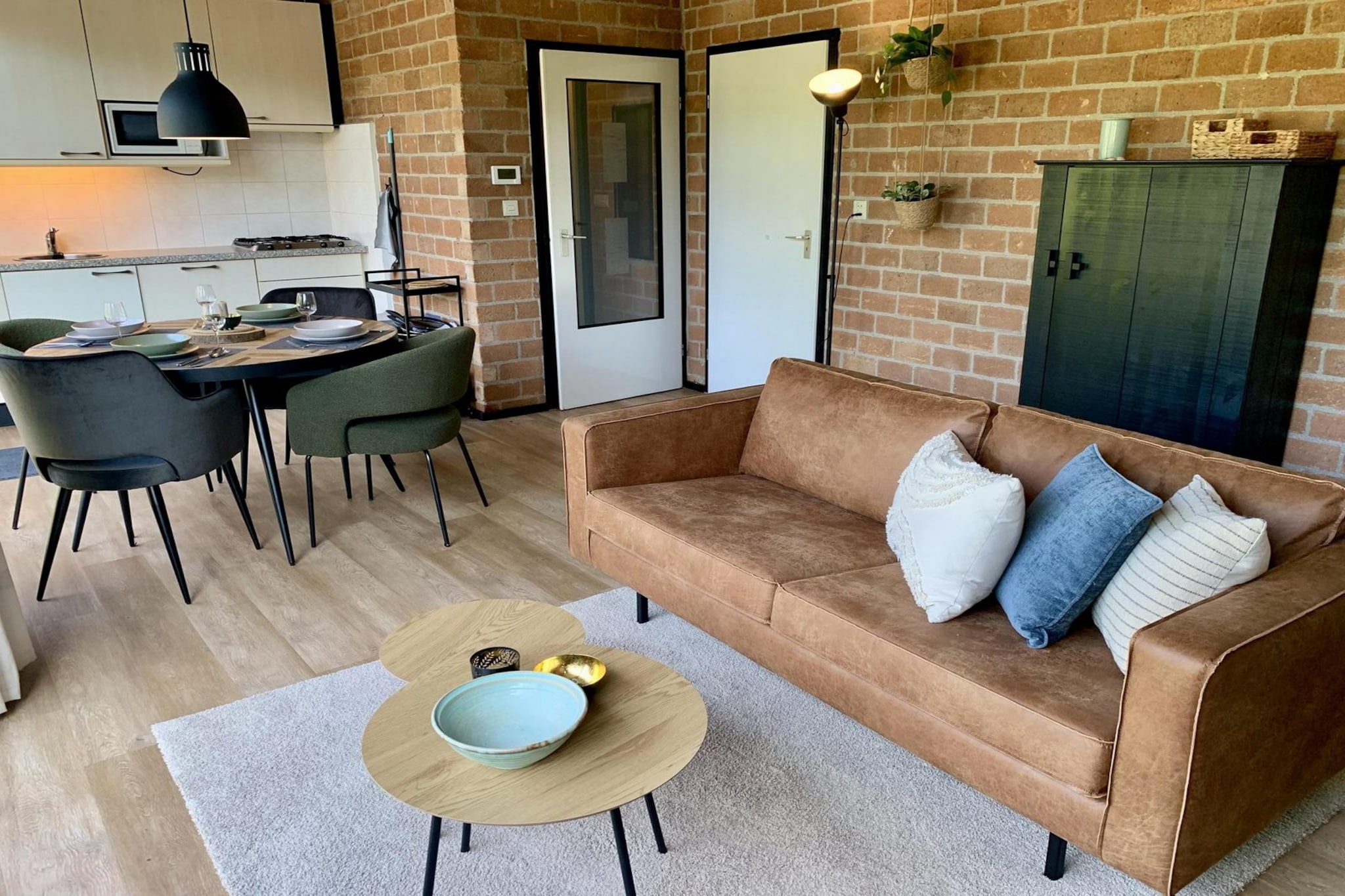 Just a short stroll from the dunes and the wide North Sea beach, this charming holiday bungalow offers the perfect escape for a family of four. Nestled in a peaceful, family-friendly park, it combines comfort, privacy, and a touch of seaside charm.

Step inside to a bright and cozy living room where you can relax on the sofa, enjoy a movie night, or share meals at the dining table. The open kitchen makes cooking easy, with everything from a fridge and freezer to a dishwasher and oven—perfect for preparing simple breakfasts or hearty dinners after a day outdoors. Two comfortable bedrooms provide space for restful nights, while the bathroom with shower and toilet keeps everything practical and convenient.

The real highlight is the garden: a spacious, sunny retreat with a large lawn where children can play safely while you unwind on the terrace. Whether you’re lounging in a chair, dining under the parasol, or firing up the barbecue, it’s a spot that invites slow mornings and long summer evenings.

With central heating, free WiFi, and a private parking space, every detail has been thought of to make your stay easy and relaxing. Surrounded by dunes, tulip fields, and the sea just minutes away, this bungalow promises the kind of holiday where memories are made.


Note: The bed-linen is optional and available for € 13 p.p./Stay.