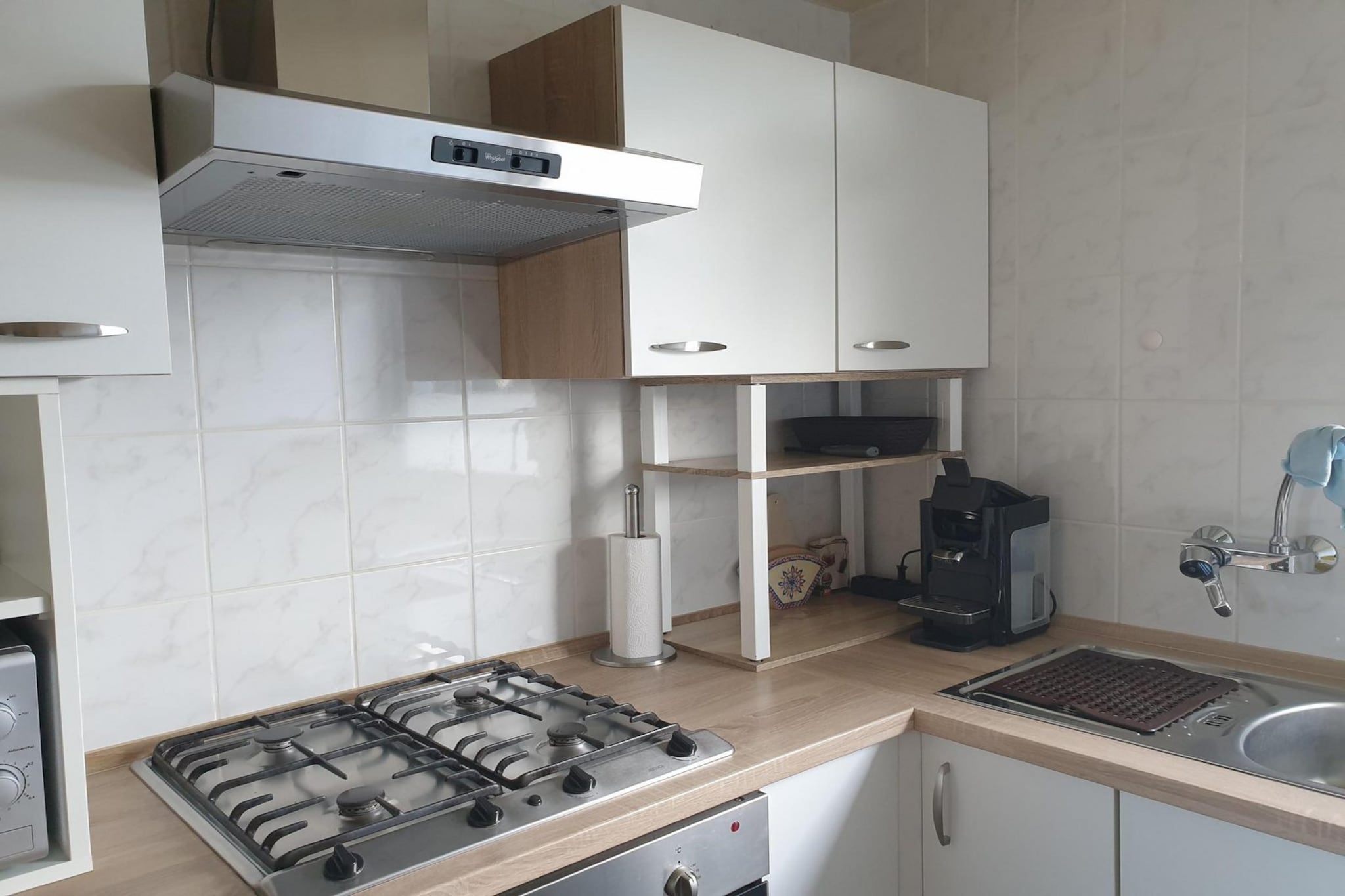 Ground floor: (Living room(TV(smart TV, german television channels, international television channels), seating area, DVD player, CD player), open kitchen(hob(gas), electric kettle, toaster, cooker, coffee machine(filter), oven, microwave, dishwasher, fridge-freezer), bedroom(double bed(180 x 200 cm)), bedroom(single bed(90 x 200 cm), single bed(90 x 200 cm)), bedroom(single bed(80 x 200 cm), single bed(80 x 200 cm)), bathroom(shower, washbasin, toilet, hairdryer))\n\nstorage(bicycle storage), cot, terrace, garden, parking, high chair