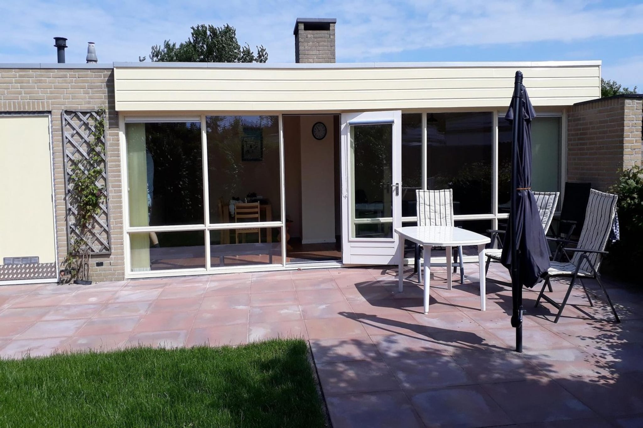 This well-kept, detached bungalow offers a comfortable stay for up to 5 guests. It features two cozy bedrooms, one with a double bed and the other with two single beds and a pull-out bed. The bungalow is equipped with modern amenities such as air heating, free Wi-Fi, and a living room with an open fireplace. The living area includes a color TV with cable connection, a radio-CD player, and a DVD player. The bungalow is designed with privacy in mind, boasting a fenced garden with a south-facing terrace and outdoor seating for relaxation. Pets are not allowed, making it suitable for allergy sufferers.

Situated in a tranquil location, the bungalow offers easy access to outdoor activities and is an ideal base for exploring the surrounding area. Guests can enjoy a peaceful environment with a nearby parking space for one car. The property is located close to local attractions and nature walks, providing plenty of opportunities for leisure and recreation. Bicycles are available for guests to use free of charge, adding convenience for those wishing to explore the area on two wheels.

The modern kitchen is fully equipped with a 4-burner gas stove, microwave, coffee machine, kettle, toaster, fridge with freezer compartment, and a dishwasher for easy meal preparation. The bathroom features a shower and a washbasin with storage space. 
Please note! Bed linen is not included as standard in your booking. You can bring your own or you can rent it from us at 13 euro p.p/stay.