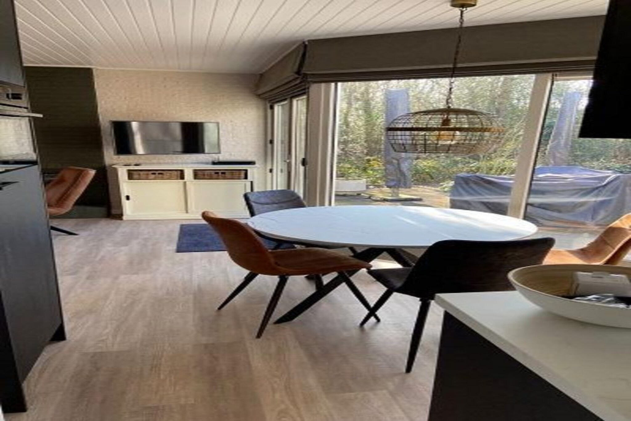 Ground floor: (open kitchen(hob(induction), electric kettle, hood, coffee machine, oven, combination microwave, dishwasher, fridge-freezer, dishes and cutlery(Bowls, chopsticks, plates, cups, etc.)), Living/diningroom(TV(cable), seating area), bedroom(bunk bed(90 x 200 cm)), bedroom(single bed(80 x 190 cm)), bedroom(single bed(80 x 200 cm), single bed(80 x 200 cm), washbasin), bathroom(shower(walk-in shower), washbasin), toilet(toilet), Internet access)\n\nwashing machine, heating, terrace, garden, bicycle storage, garden furniture, parking, high chair