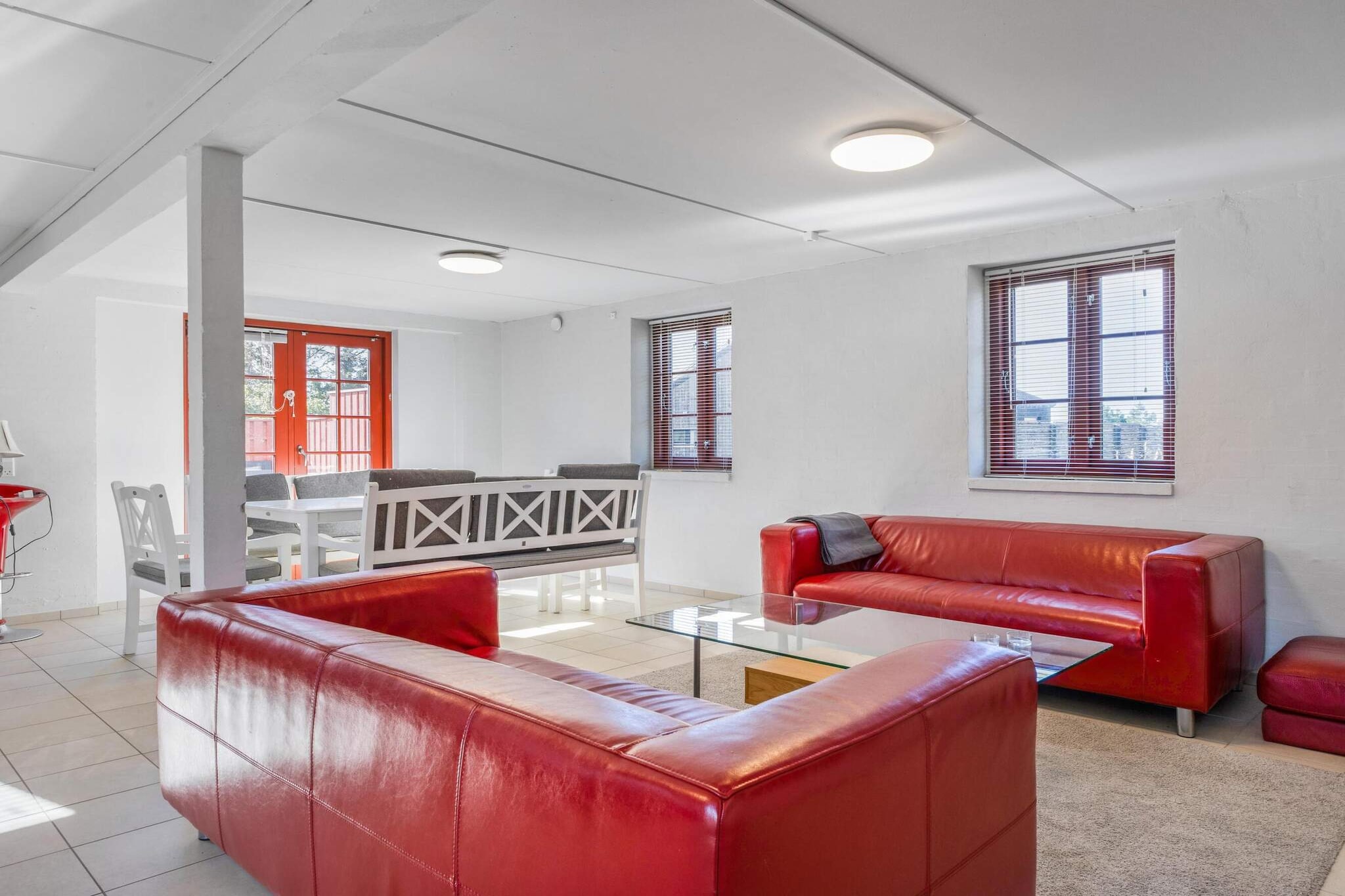 Møllehusets Baghusets and Anneks are perfect holiday homes for families or groups of friends, located just 1 km from the beach and close to Blokhus town center. These two buildings can accommodate up to 8 people, with the Back House featuring a cozy living room, kitchen, and bathroom with a shower, while the newly built Annex offers four single beds, ideal for youth groups or additional guests. The shared pool house, located in a separate building, offers guests access to a lovely pool and sauna for relaxation. The pool house is shared with the Farmhouse, making it perfect for larger groups or families who wish to socialize and enjoy a communal experience. The property is set within Møllehusets, a complex of four buildings, which includes the Farmhouse and Pool House. The Back House and Annex are separated by a terrace fence, and each has its own parking area. The Annex is on one level, while the Back House features two floors, with four single beds located on the first floor. The accommodation includes 2 double beds in the en suite bedroom of the Back House and 4 single beds in the Annex, ensuring plenty of room for all guests. With modern amenities and spacious interiors, this property is ideal for both relaxation and fun. The expansive 3000-square-meter plot offers ample outdoor space to enjoy nature, and the peaceful setting often attracts wildlife such as deer. The North Sea and one of Denmark’s best beaches are just a short walk away, and guests can drive down to the beach with ease. Blokhus town is within walking or cycling distance, offering plenty of shopping, dining, and entertainment options. The nearby area is perfect for hiking, cycling, and exploring, with scenic trails to discover. This is a wonderful destination for those seeking a blend of outdoor adventure, peaceful surroundings, and family-friendly fun.