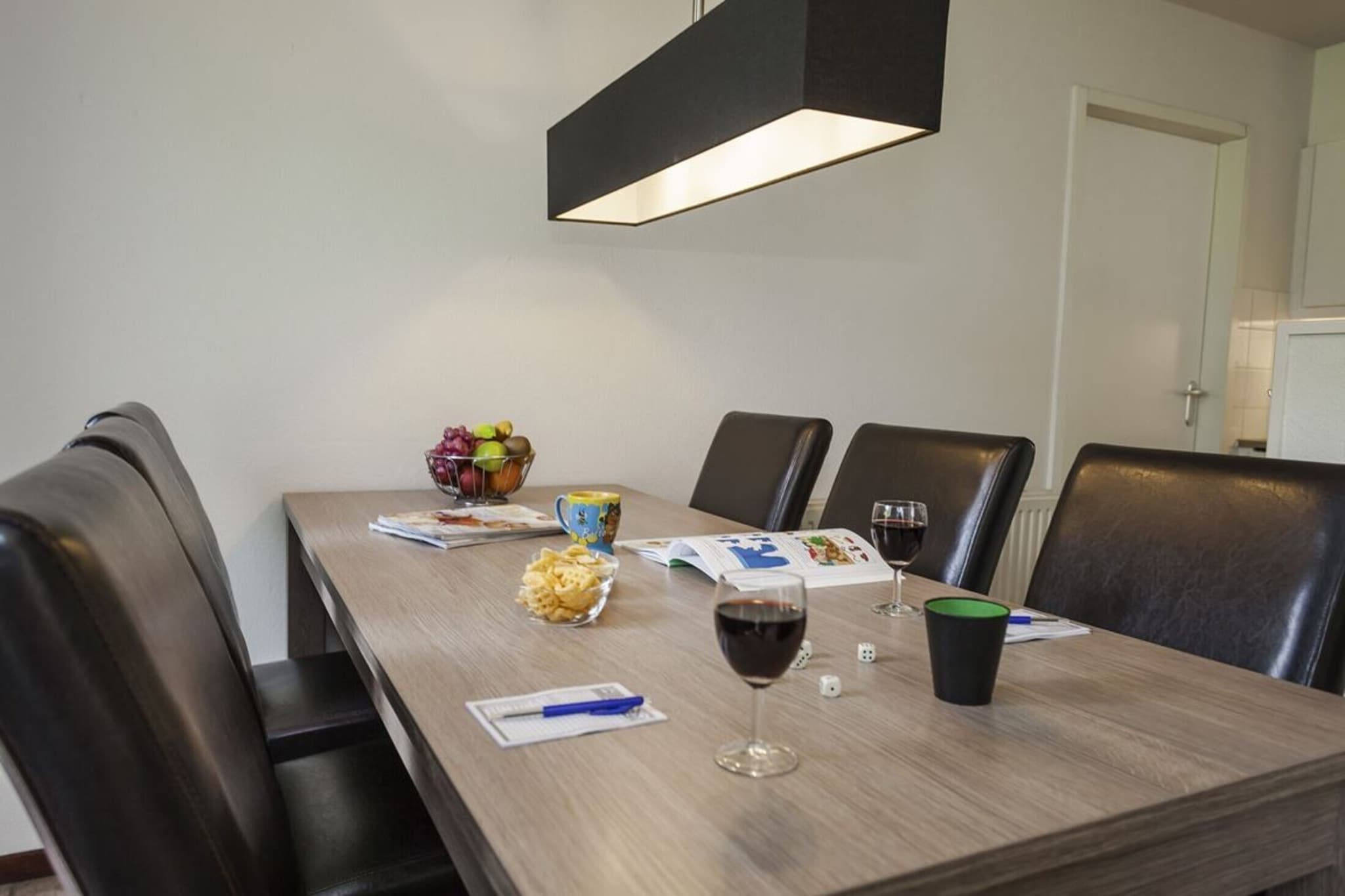 Ground floor: (open kitchen(hob(4 ring stoves, gas), electric kettle, coffee machine, combination microwave, dishwasher, Juicer), Living/diningroom(TV(flatscreen), fireplace, Blu-ray player), bedroom(double bed or 2 single beds(duvet, 90 x 200 cm)), bathroom(bath tub, shower, washbasin, toilet), Internet access)\n\nstorage, cot, patio, heating(central), garden furniture, high chair