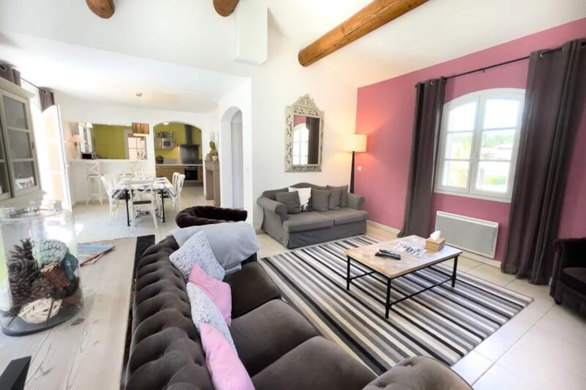 This beautiful villa, located in the heart of a private estate, offers four air-conditioned bedrooms, including one on the ground floor, with high-quality bedding for ultimate comfort. The villa features a private heated swimming pool, operational from June to September, and a well-maintained garden offering peaceful views of the adjacent golf course and pine forest. The property is secure, with a guard post at the entrance and child safety devices in place, ensuring a safe and tranquil environment for families. A welcoming staff member is available to assist throughout your stay.

The villa is ideally located in Provence, near stunning attractions such as Fontaine de Vaucluse, Les Baux de Provence, St. Remy de Provence, and Aix-en-Provence. For those seeking charming towns, you can visit Isle sur la Sorgue, Gordes, Sault, Lauris, Lourmarin, and the Sainte-Victoire site. Additionally, local markets and cafes provide authentic tastes of the region, while the beautiful surroundings invite outdoor activities and exploration.

The villa is fully equipped with a modern kitchen, spacious bathrooms, and essential amenities, including high-quality linen, baby equipment, and a private garage for convenient parking. The private pool features an electric roller shutter for safety, and the property’s landscaping is carefully maintained. A personalized welcome ensures a seamless stay, with everything prepared for your arrival.