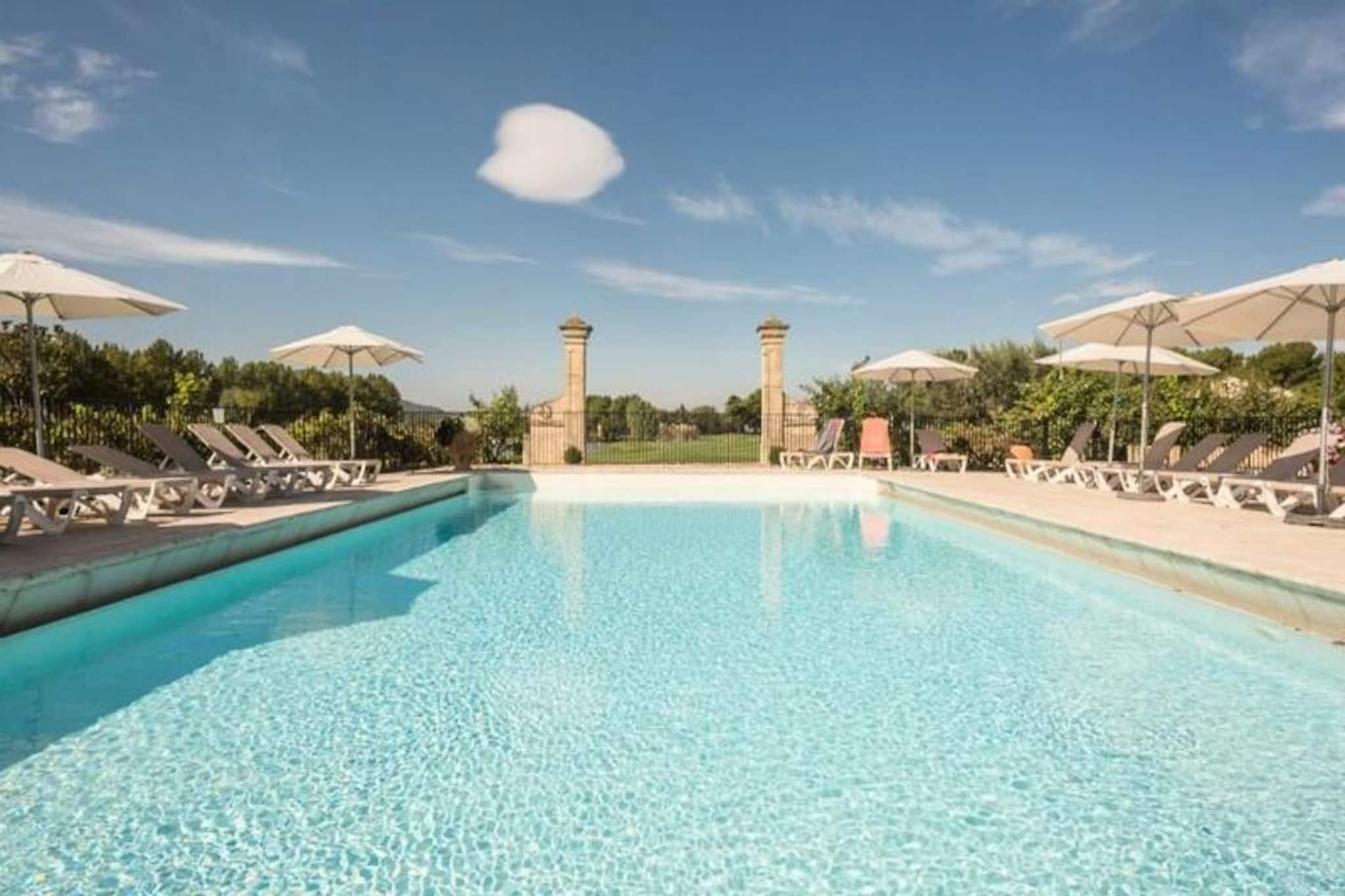 In the Pont Royal area located between Avignon and Aix-en-Provence, you can stay in the Hôtel du Golf de Pont Royal. We offer apartments with views of the golf course or swimming pool near the village center.
 
 
 
 With these rentals you will be able to enjoy all the leisure activities offered in the village: the huge aquatic area, the mini farm, entertainment, fitness, sports fields. Other activities with supplement are also offered on the estate: golf, horse riding, tennis 
 
 
 
 To fully enjoy your vacation in Provence, with family or friends, you can explore the surroundings of Mallemort and the village of Pont Royal, which are full of tourist and cultural sites.
 
 
 
 Openings:
 
 - Heated wave pool: 06/04 to the end of August with slides and wild river
 
 - Rock pool: mid-July to end of September
 
 - Hillsides swimming pool: 01/06 to 30/09/24
 
 
 
 Please note: you have access to the swimming pool reserved for the Hôtel du Golf.&nbsp;
 Your vacation rental includes: 1 nicely decorated living room, 1 equipped kitchen, 1 pretty bedroom, 1 bathroom, 1 toilet, 1 large balcony with a clear view and 1 parking space.
 
 The advantages of your super Home rental: Air-conditioned apartment, renovated in 2023, benefiting from a west-facing balcony, located in the village of Pont Royal with its many facilities including a beautiful swimming pool.
 
 
 
 Area: 35 m².
 
 
 Location:
 
 
 Floor of accommodation: 1st floor of the Hôtel du Golf building
 Beach or slope access: No
 Town or village center: Village center
 Distance to slopes / sea: Yes
 Business distance: <100m
 Distance activities: <100m
 Number of housing levels: Single storey
 
 &nbsp;
 
 
 
 Composition of the stay: &nbsp;
 
 
 Standard sofa: No
 Sofa seating: No
 Convertible sofa: Yes
 Number of beds on the convertible sofa: 2
 Table in the dining room: Yes
 Number of chairs (or stools): 4
 Coffee table: Yes
 Fireplace: No
 
 &nbsp;
 
 
 
 Meal side:
 
 
 Type of cuisine: Semi-Open
 Table in the kitchen: No
 Number of chairs in the kitchen: No
 
 &nbsp;
 
 
 
 Composition of the room:
 
 
 Single beds: 0
 Double beds: 1
 Bunk beds: 0
 
 &nbsp;
 
 
 
 Composition of the bathroom:
 
 
 Condition of the main bathroom: Good condition
 A private water closet inside the accommodation: Yes
 A second private bathroom with independent access: No
 A second water closet: No
 
 &nbsp;
 
 
 Exteriors:
 
 Balcony: Yes
 Opposite balcony: No
 Balcony view: Other
 Balcony orientation: West
 Parking dedicated to accommodation: Yes
 Type of Parking: Covered
 
 
 
 
 &nbsp;
 
 
 How would you describe the brightness of the accommodation as a whole? : Bright
 
 
 
 
 Live the maeva.com experience in this certified accommodation from our maeva Home Prestige Label: treat yourself.
 
 Choose apartments that have been recently and tastefully renovated and offer you a range of quality services.
 
 
 
 The plus of the maeva super Home experience:
 
 A personalized welcome and quality services directly included in the price of your rental: bed linen, bathroom linen, beds made on arrival, final cleaning, wifi access and maintenance kit. Everything is thought of to ensure you have an excellent stay!
 
 Pets allowed - In addition, inquire directly with the residence for prices.
 Bed linen - Included - fitted sheet/flat sheet, sheet or duvet cover, pillowcase: may vary depending on residence.
 Possibility of daily linen change available at an additional cost, inquire at reception for prices.
 Towels - Extra charge. Possibility of daily linen change available at an additional cost, inquire at reception for prices.
 Baby cot - Subject to availability - to be reserved at reception.
 End of stay cleaning - Additional charge. Mandatory cleaning service to be paid upon check-in or upon arrival.
 Daily cleaning - Available at an additional cost, inquire at reception for rates.
 Parking - For accommodation that does not have a private parking space, it is possible to park in the Visitor Parking lot.
 Covered parking - With supplement - 525 spaces - subject to availability.
 Shared swimming pool - Openings:
 - Heated wave pool: 06/04 to the end of August with slides and wild river
 - Rock pool: mid-July to end of September
 - Hillsides swimming pool: 01/06 to 30/09/24
 Tourist tax (additional charge) - Payment of the tourist tax is made via your personal space. Amount varies depending on location. Free for under 18s.
 Deposit (in euros) - 500