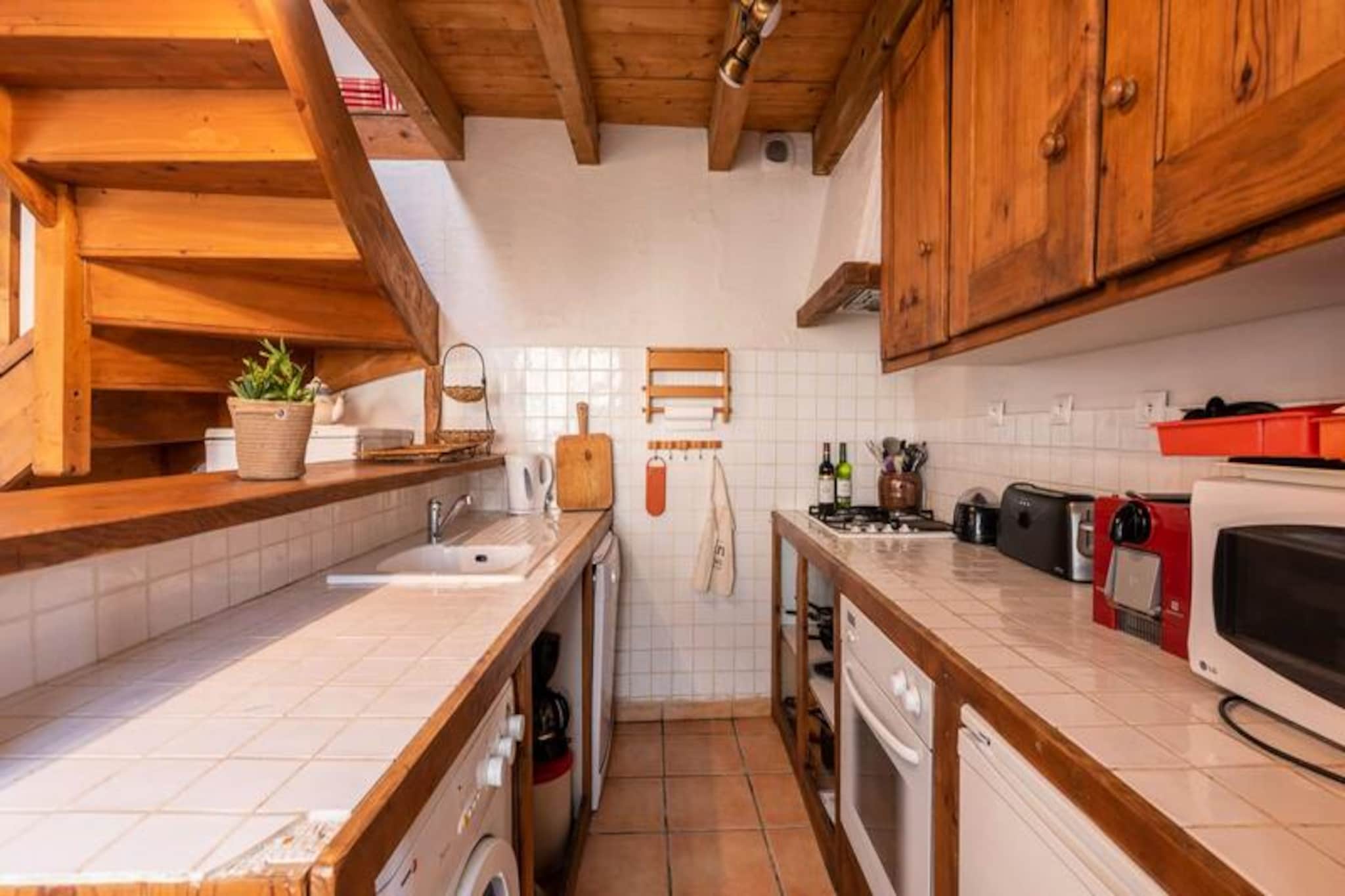 In Vielle-Aure, a typical village in the Pyrenees, you will enjoy an old house completely renovated with taste and a view of the Pla d'Adet ski resort. You will find 2 parts, 11 beds in total.
 The first part, duplex, has, on the ground floor, an equipped kitchen, and a large living/dining room with a large fireplace for cozy evenings!
 Upstairs, you will find a landing with a single bed, a master suite with a double bed and a small bed and its private bathroom, a large bedroom with a double bed and a small bed. An additional bathroom is at your disposal.
 In the 2nd part, you will find upstairs, a studio with a double bed, a mini kitchenette and a bathroom. On the ground floor, a bedroom with two single beds and private bathroom!
 The ideal place for 2 families with:
 - conviviality thanks to a cozy and welcoming dining room with its large farm table and fireplace
 -privacy with its two separate “night” areas and 4 bathrooms.
 You will also enjoy a beautiful exterior with 2 gardens/terraces, and direct access to the Neste d'Aure, where you can stroll along the river, on these marked and maintained trails. 
 Any malfunction in the common areas or common use of the residence will not give rise to any compensation.
 At your disposal to facilitate your stay.
 Free WiFi
 Options on request: cleaning package €300/Sheet rental €12/pair 
 Towel kit €7/person
 Pets not accepted Thank you
 
 After booking your vacation rental, let yourself be guided, you can:
 - book your mountain activities! Snowshoeing, snowmobile outings, canyoning, mountain excursions...
 All this supervised by a qualified professional!
 - book your ski lift passes, which will be available when you arrive at our agency.
 - reserve your ski equipment at a preferential rate.
 Partners at your service: Altiservice, Sports 2000, Office des Sports, dogsitter
 
 Heating - 1
