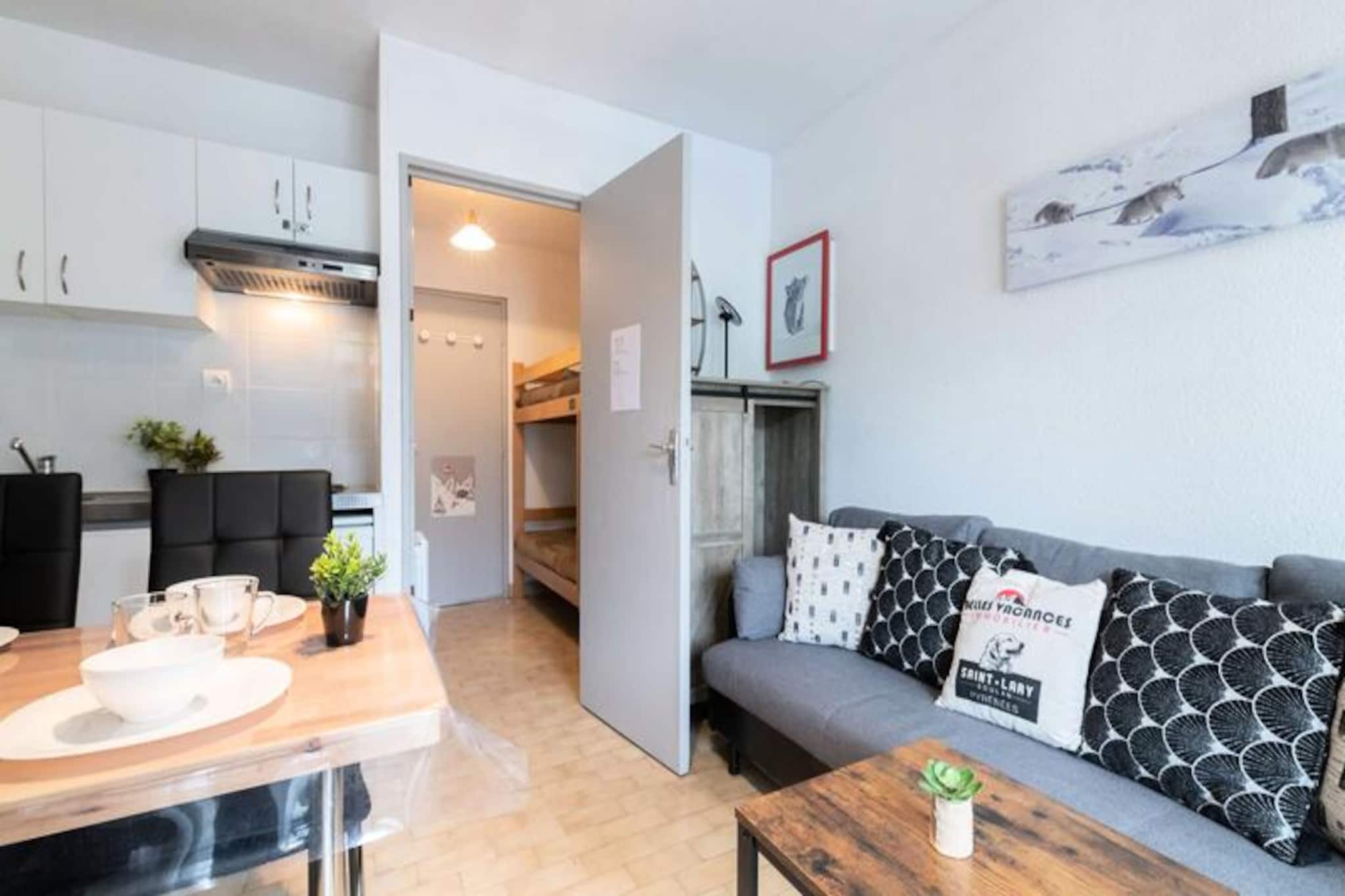 This beautiful apartment comfortably accommodates up to four guests. The description does not specify the bed configuration but implies it is suitable for a small family or group. Pets are not allowed.
Located in a village very close to St Lary, the apartment offers easy access to the slopes via a free shuttle service with a stop very close to the residence. This provides convenient access to the cable car or gondola. The description mentions partnerships for booking mountain activities (snowshoeing, snowmobile outings, canyoning, mountain excursions) and ski equipment rental at preferential rates, suggesting a focus on winter sports. No specific information is provided about nearby shops, restaurants, or markets within the immediate vicinity of the apartment itself, but it is implied that St Lary is close by and would offer such amenities.
To facilitate your stay, options available upon request include a cleaning package, sheet rental, and towel kits. A Wi-Fi box can also be rented. Heating is available in the apartment. The description notes that malfunctions in common areas will not result in compensation.