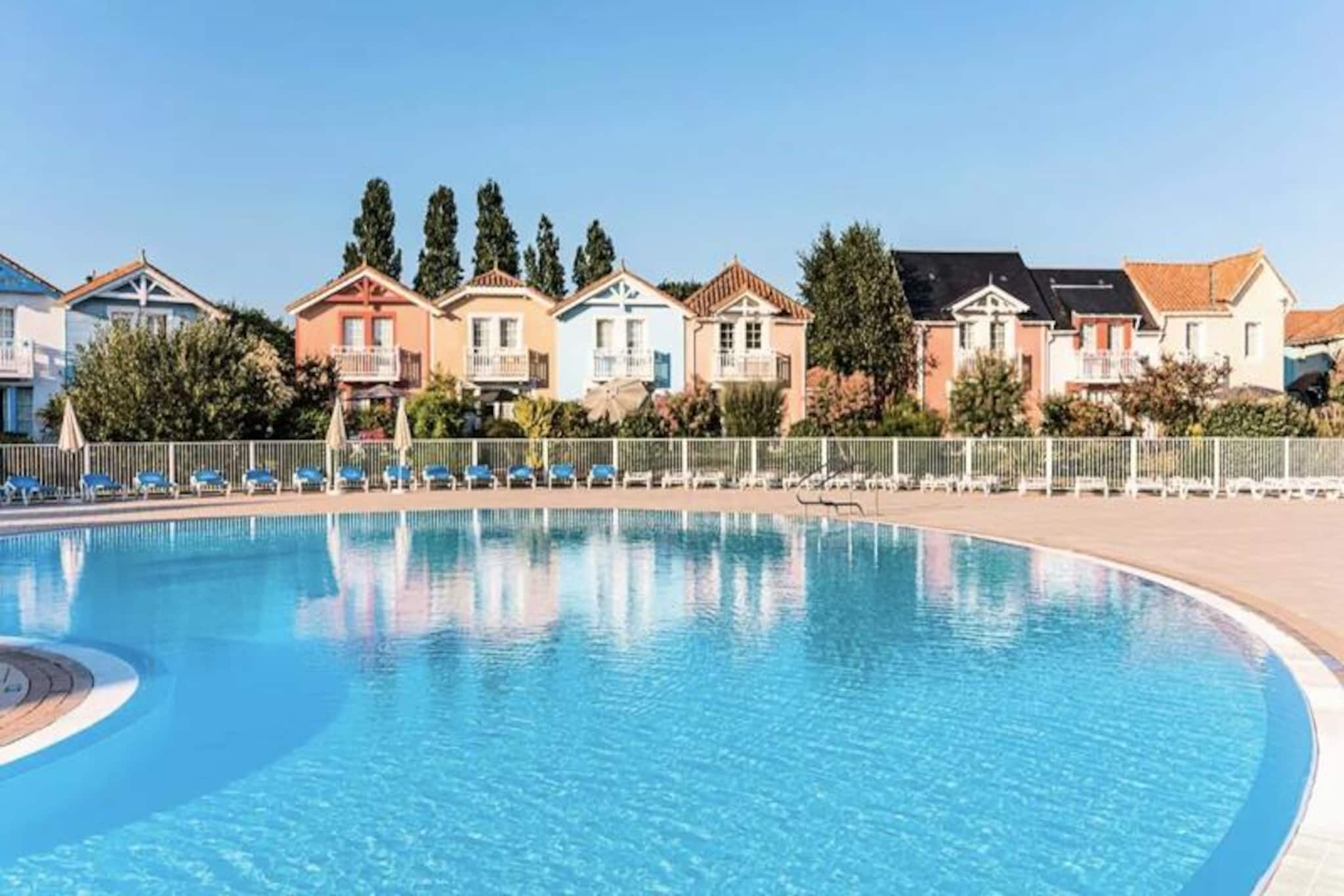 Take advantage of our selection of holiday homes in Port-Bourgenay for your family stay on the Vendée coast. In the heart of the Port-Bourgenay residence, our private houses with terrace are characterized by pastel colors and benefit from an ideal location on the coast. A stone's throw from the Bourgenay marina, our private houses with terraces are decorated in a traditional style which recalls the charm of the seaside resorts of the Belle Epoque.
 
 
 
 For your vacation in Talmont-Saint-Hilaire, choose our vacation rentals located a stone's throw from the Port-Bourgenay marina!
 
 
 
 In the Bocage district, you will find:
 
 A heated swimming pool, with paddling pool and equipped beach (open from 06/15 to 09/02, reserved for vacationers staying in this area).
 
 
 
 In the Moulin district, you will find:
 
 A heated swimming pool, with swimming pool, paddling pool and equipped beach (open from 06/15 to 09/08, reserved for holidaymakers staying in this area).
 
 
 
 In the center of the residence, you will find:
 
 Heated pools, with slides and a paddling pool with water games. (open from 04/27 to 09/12)
 
 &nbsp;
 Your vacation rental includes: 1 living room, 1 kitchen, 2 bedrooms, 1 bathroom, 2 separate toilets and 1 terrace.
 
 The advantages of your rental: House with furnished south-facing terrace, view of the village.
 
 &nbsp;
 
 
 
 Area: 45 m².
 
 
 Location:
 
 
 Floor of accommodation: Ground floor, Les Alouettes
 Beach or slope access: No
 Town or village center: No
 Distance from slopes to sea: >500m
 Distance to business: >500m
 Distance activities: >500m
 Number of housing levels: 1 floor / Duplex
 
 &nbsp;
 
 
 
 Composition of the stay: &nbsp;
 
 
 Standard sofa: No
 Sofa seating: No
 Convertible sofa: Yes
 Number of beds on the convertible sofa: 2
 Table in the dining room: Yes
 Number of chairs (or stools): 6
 Coffee table: Yes
 Fireplace: No
 
 &nbsp;
 
 
 
 Meal side:
 
 
 Type of cuisine: Semi-Open
 Table in the kitchen: No
 Number of chairs in the kitchen: No
 
 &nbsp;
 
 
 
 Composition of the rooms:
 
 
 
 &nbsp; &nbsp; &nbsp; &nbsp; Bedroom 1:
 
 
 Single beds bedroom 1: 2
 Double beds bedroom 1: No
 Bunk beds bedroom 1: No
 
 
 
 Bedroom 2:
 Single beds bedroom 2: No
 Double beds bedroom 2: 1
 Bunk beds bedroom 2: No
 
 &nbsp;
 
 
 
 Composition of the bathroom:
 
 
 Condition of the main bathroom: Good condition
 A private water closet inside the accommodation: Yes
 A second private bathroom with independent access: No
 A second water closet: Yes
 
 &nbsp;
 
 
 Exteriors:
 
 Balcony: No
 Opposite balcony: No
 Balcony view: No
 Balcony orientation: No
 Terrace: Discovery
 Opposite terrace: No
 Terrace view: Village
 Terrace orientation: South
 Garden: No
 Overlooking the garden: No
 Garden view: No
 Garden orientation: No
 Parking dedicated to accommodation: No
 Type of Parking: Covered
 
 
 
 
 &nbsp;
 
 
 How would you describe the brightness of the accommodation as a whole? : Normal
 
 &nbsp;
 
 maeva Home Selection label:
 
 Maintained apartments, up to date, and with quality equipment. For a successful and comfortable vacation.
 
 Wifi access - With supplement - subject to availability.
 Pets allowed - In addition, inquire directly with the residence for prices.
 Bed linen - At an additional cost - content may vary depending on the residence: fitted sheet, sheet or duvet cover and pillowcase.
 Towels - Extra charge. Possibility of changing daily linen available, inquire at reception for prices.
 End of stay cleaning - Mandatory cleaning service to be paid upon check-in or upon arrival.
 Swimming pool - - In the Bocage district, you will find:
 Heated swimming pool, paddling pool and equipped beach (reserved for holidaymakers staying in this area)
 - In the Moulin district, you will find:
 Heated swimming pool, swimming pool, paddling pool and equipped beach (reserved for holidaymakers staying in this area).
 Information from the maeva Home agency.
 - In the center of the residence, you will find:
 Heated pools, slides and paddling pool with water games.
 
 Opening dates: 
 The center swimming pool: 04/27 to 09/12
 Slide and swimming pool supervised only from 01/07 to 31/08
 The Moulin swimming pool: 06/15 to 09/08
 The Bocage swimming pool: 06/15 to 09/02
 Tourist tax (additional charge) - Payment of the tourist tax is made via your personal space: https://mon-compte.maeva.com, the amount varies depending on the location. Free for under 18s.
 Television - Depending on your accommodation
 Deposit (in euros) - 1200
 End of stay cleaning - Mandatory cleaning service to be paid upon check-in or upon arrival.
 Bed linen - Additional charge.