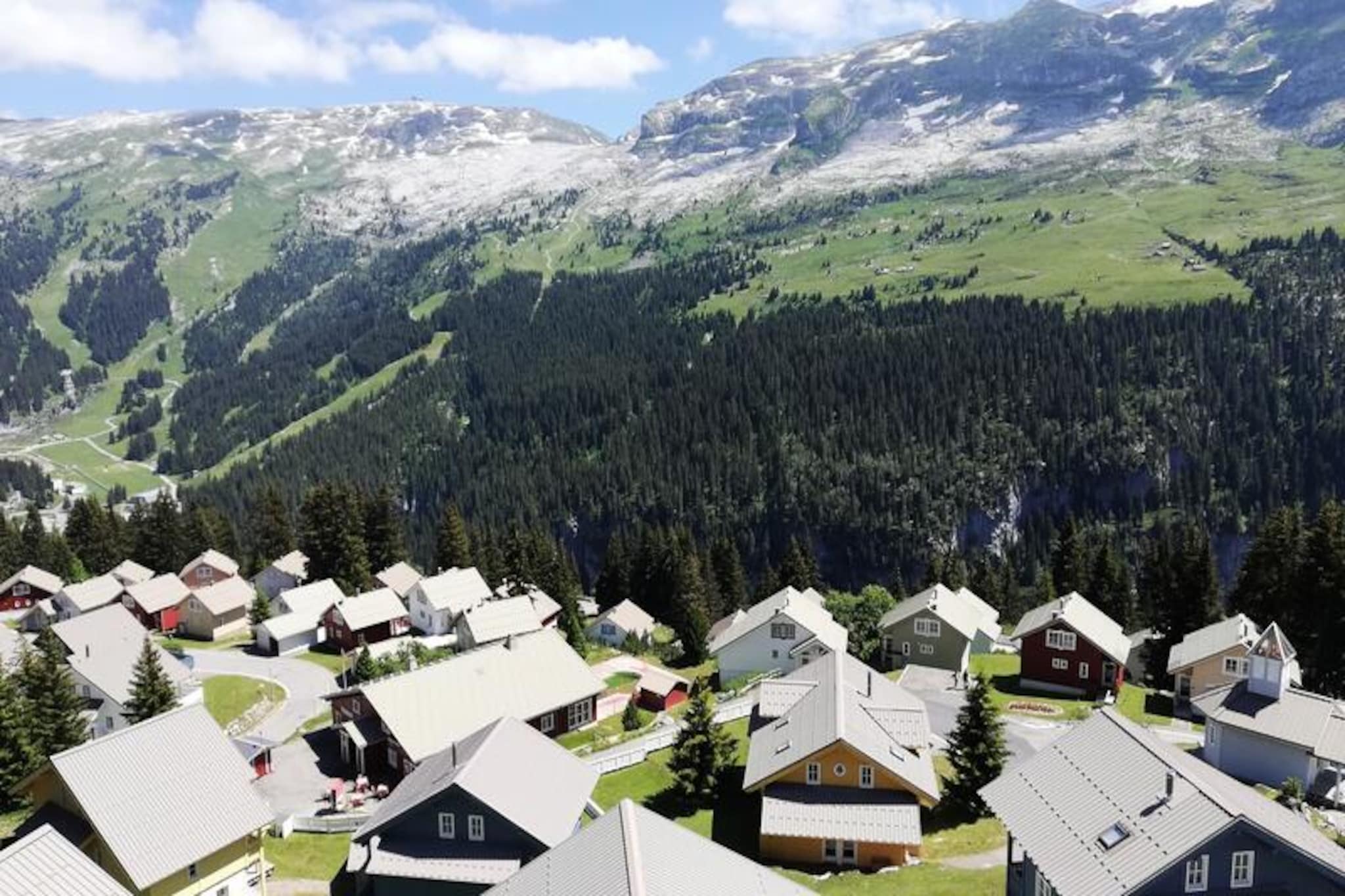 This charming chalet offers 84 m² of space for a comfortable stay, accommodating up to 8 people. It features three bedroomstwo with single beds and one with a double bedplus a mezzanine with additional beds. The living room includes a standard sofa, fireplace, and a coffee table. Two bathrooms, one with a shower and the other with a bathtub, provide ample convenience. The property is not pet-friendly, and extra charges apply for bed linen, bathroom towels, and end-of-stay cleaning.
Nestled in a quiet area at an altitude of 1800 meters, the chalet offers breathtaking views of the surrounding mountain cirque. It is ideally located near the resorts ski slopes, just 100-500 meters away, and close to local attractions. On-site amenities include a restaurant serving traditional regional cuisine and a bread store. The grocery store is conveniently located nearby in another residence, while the Leisure Pass provides free access to various activities, ensuring a memorable stay.
The chalet is equipped with an American-style kitchen, complete with a dishwasher and washing machine. It also includes two bathrooms with electric towel dryers and storage space. Enjoy meals on the south-facing terrace, which offers stunning mountain views. A covered parking space is available for added convenience, ensuring a comfortable and well-equipped stay in the Alps.