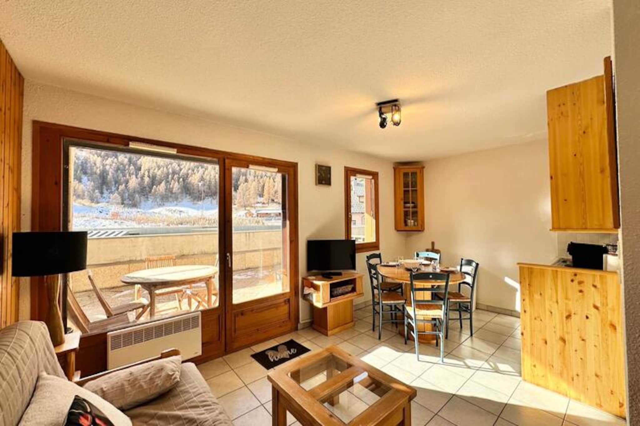 This charming **apartment** is ideally located in the upper part of the resort, just 200 meters from the slopes, offering easy access to both outdoor activities and amenities. It features a cozy double bedroom equipped with a television, and a dedicated sleeping area, ensuring comfort for all guests. The living room is furnished with a sofa bed (140 x 190), perfect for additional sleeping arrangements. Wi-Fi is available throughout the property for your convenience. 

The surrounding area provides everything you need for a perfect mountain getaway. You’ll find shops just a short walk away (200 meters), making it easy to stock up on supplies. Enjoy a variety of nearby cafes and restaurants, ideal for a cozy après-ski experience. The resort's slopes are just steps away, ensuring easy access to skiing or snowboarding activities.

The **apartment** comes with a fully equipped kitchen, including a refrigerator, combination microwave, toaster, and a Philips L'Or coffee machine (Nespresso compatible). It also features a bathroom with a washing machine and a separate WC. A spacious 25 m² south-facing terrace offers a perfect spot to relax in the sun. Additional amenities include a garage in the basement, a ski room, and hairdryer.