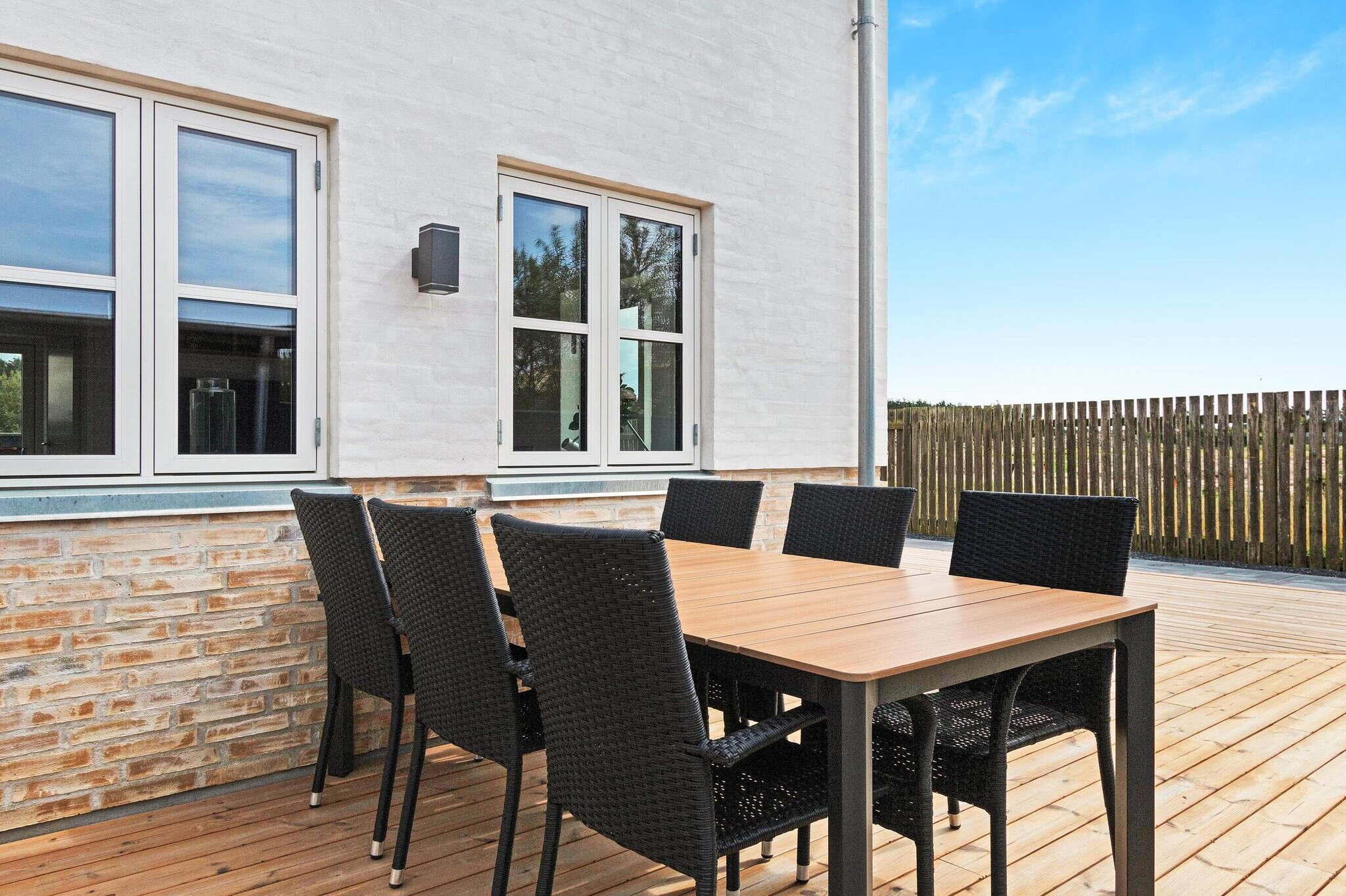 This charming, modern holiday home, built in 2022, offers the perfect blend of comfort and style for guests seeking a contemporary getaway. Josefine's Garden 135 features three cozy bedrooms on the first floor, alongside a spacious living room. With two bathrooms, the house comfortably accommodates up to six guests. The ground floor boasts a well-equipped kitchen and living room, with large windows that flood the space with natural light, providing a welcoming atmosphere throughout.

Nestled in the scenic Josefines Have area, the home enjoys beautiful views of the surrounding cottage areas and Vendsyssel Park, just a short walk from the beach via Søndergade. The area is serene and peaceful, with minimal traffic and a safe environment thanks to its dead-end roads and only one entrance. The back garden is enclosed and private, offering a perfect spot for relaxation. The beautiful cottages in the area are all well-maintained, with red roofs and large windows that create a picturesque setting.

For added convenience, the holiday home includes modern amenities such as a private terrace, ideal for enjoying the fresh air in a tranquil environment. The home is non-smoking, and youth groups or parties are not permitted, ensuring a calm and respectful atmosphere for all guests.

A refundable deposit might be charged closer to your check-in date. This deposit covers utilities consumed during your stay and any additional services that may be taken. The final amount will be adjusted based on actual meter readings, actual usage of extra services, and any remaining balance will be refunded within 21 days after checkout.